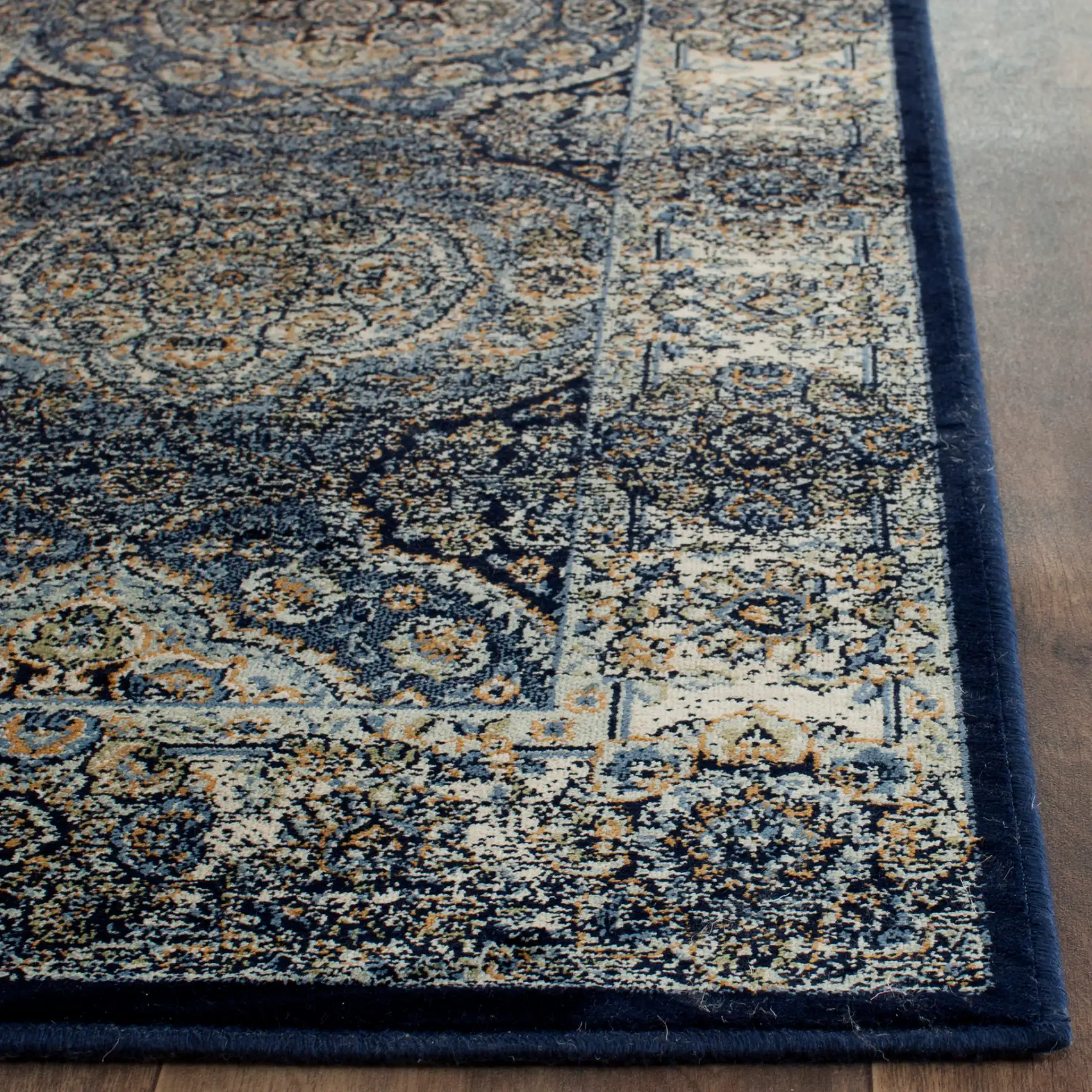 Persian Garden Vintage Traditional Allover Viscose Rug in Navy / Ivory in a styled room