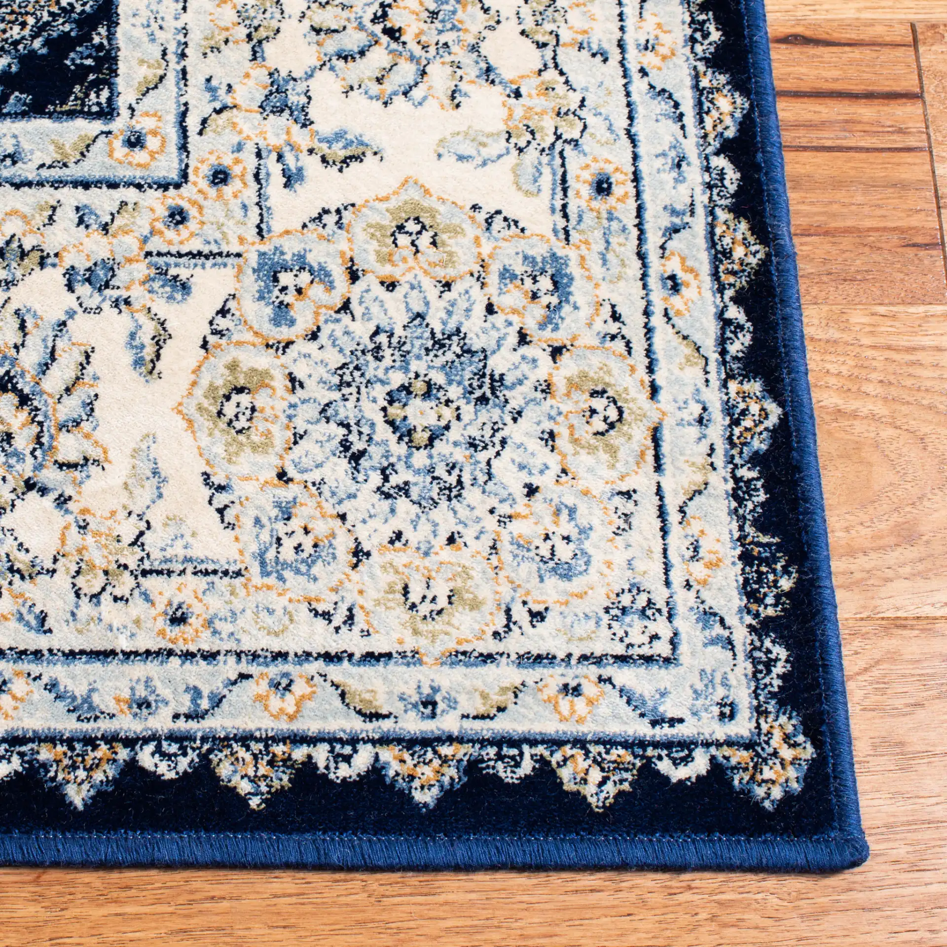 Persian Garden Vintage Traditional Allover Viscose Rug in Navy / Ivory in a styled room