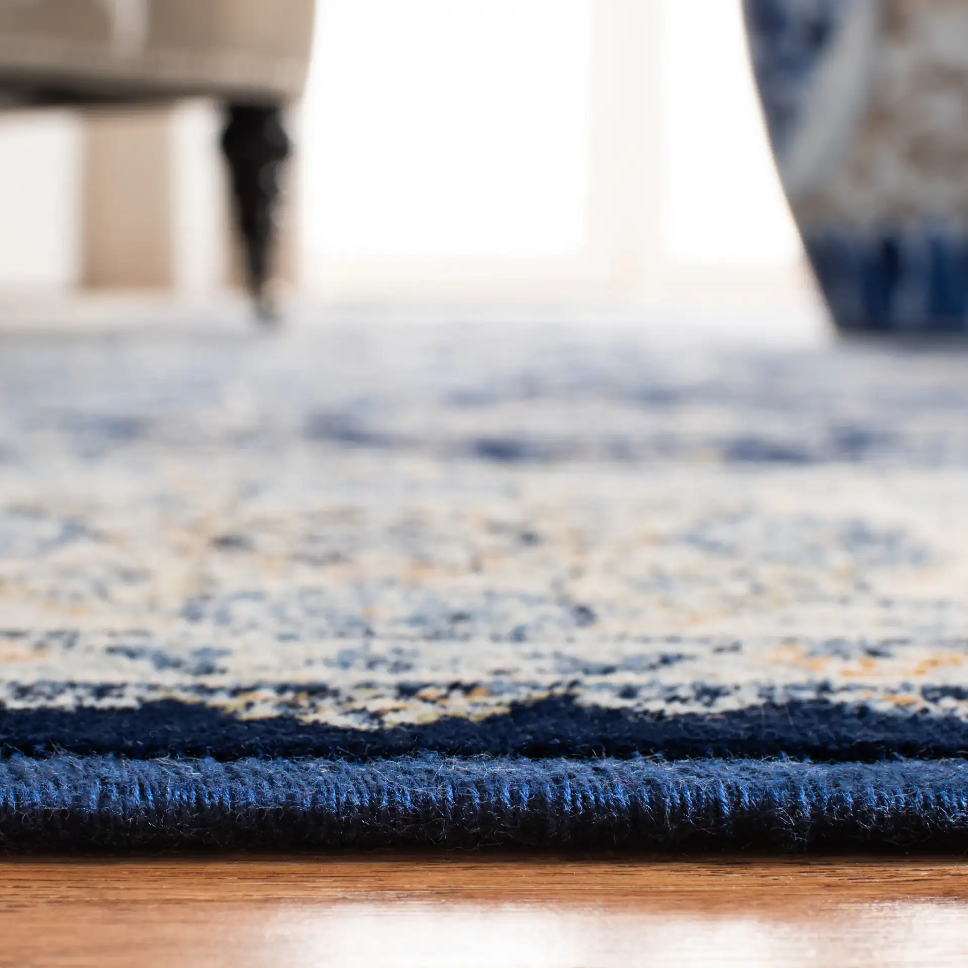 Persian Garden Vintage Traditional Allover Viscose Rug in Navy / Ivory in a styled room