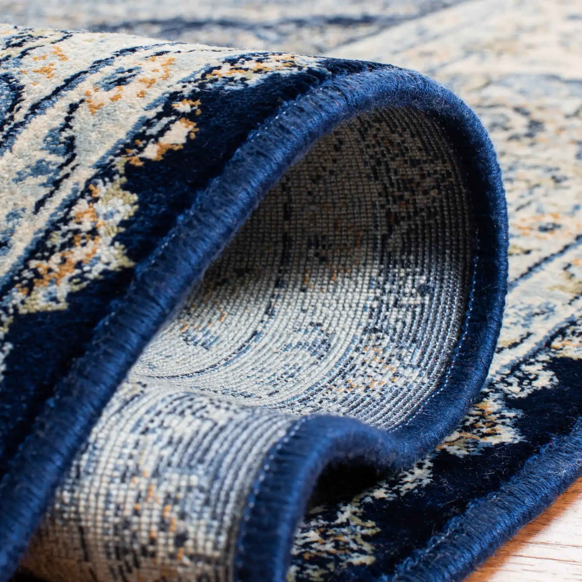 Persian Garden Vintage Traditional Allover Viscose Rug in Navy / Ivory in a styled room