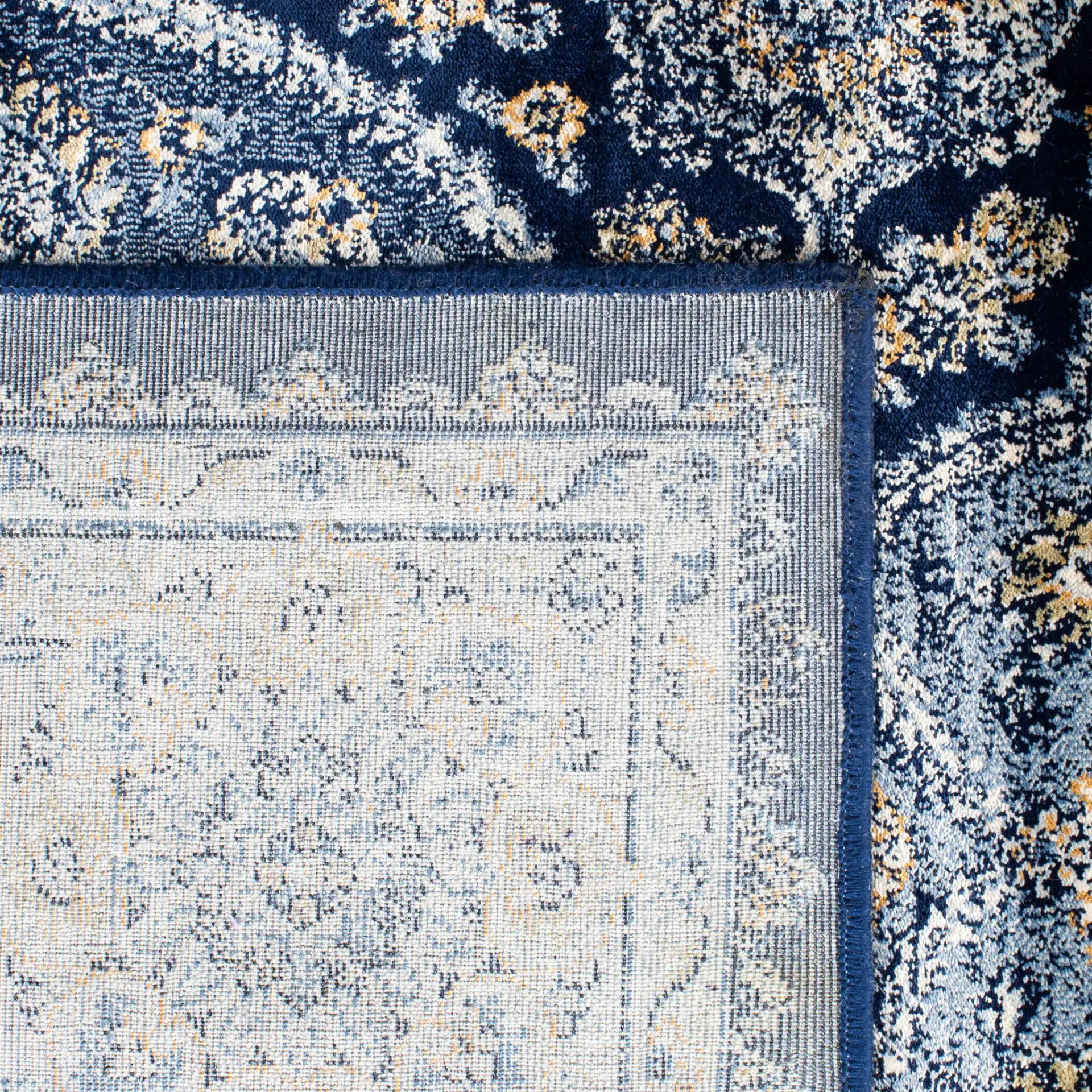Persian Garden Vintage Traditional Allover Viscose Rug in Navy / Ivory in a styled room