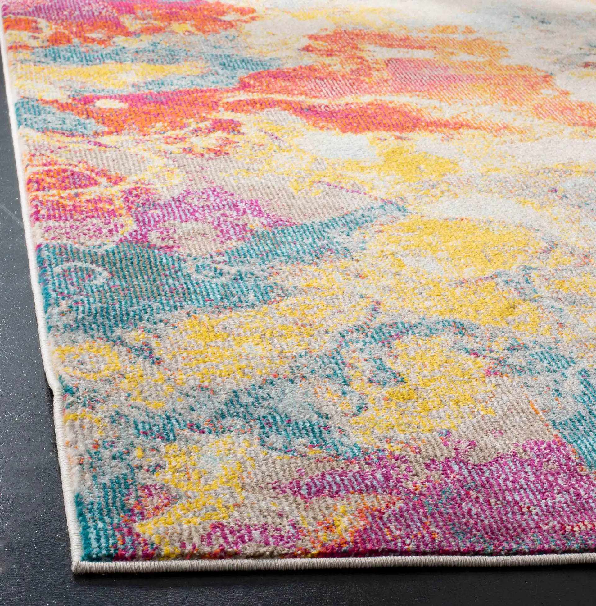 Phoenix Abstract Splatter Rug in Blue / Orange in a styled room