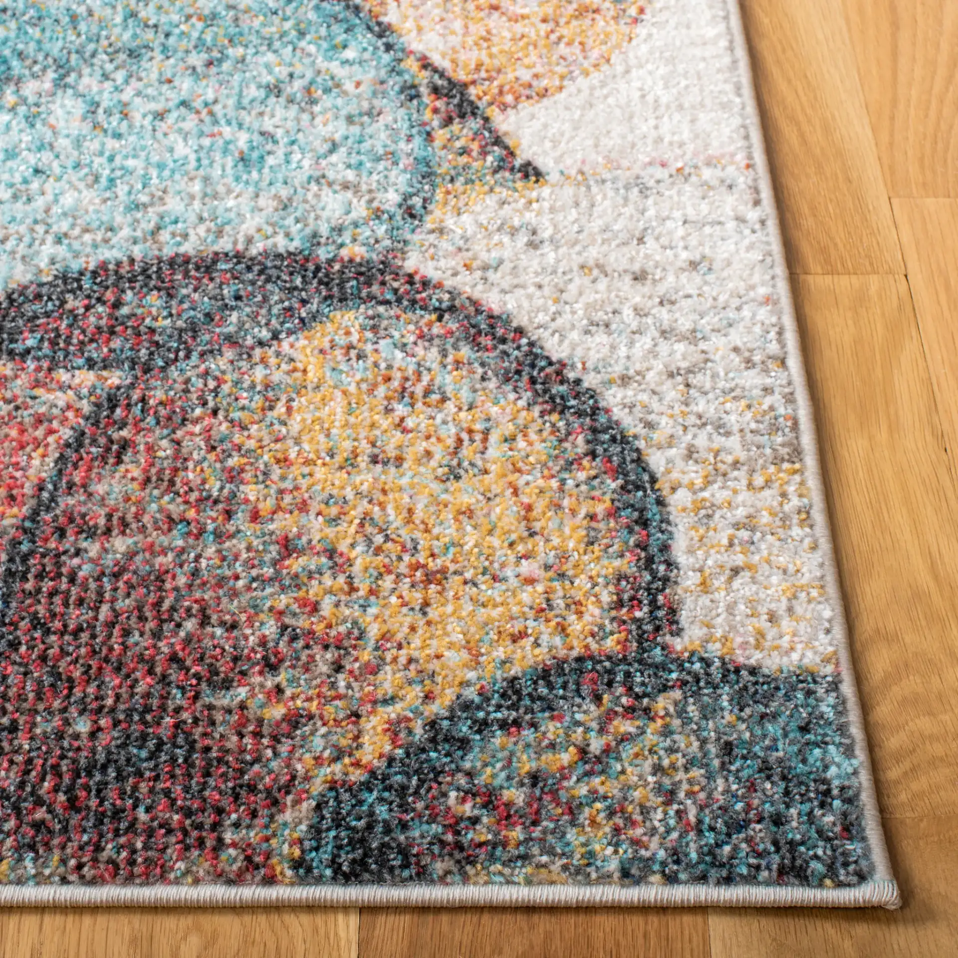 Phoenix Overlapping Circles Rug in Ivory / Rust in a styled room