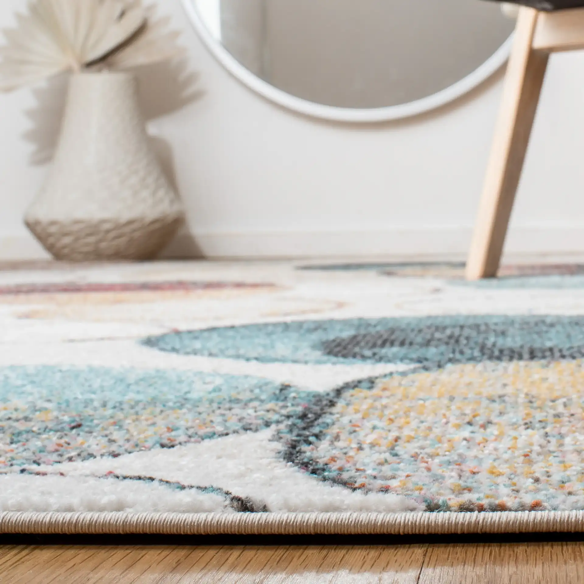 Phoenix Overlapping Circles Rug in Ivory / Rust in a styled room
