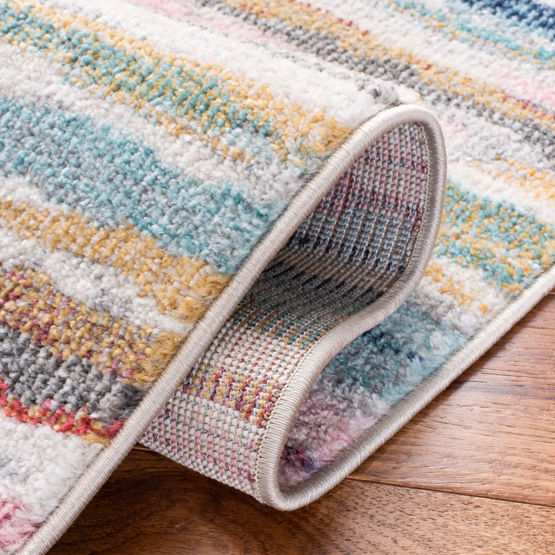 Phoenix Painterly Stripe Rug in Ivory / Blue in a styled room