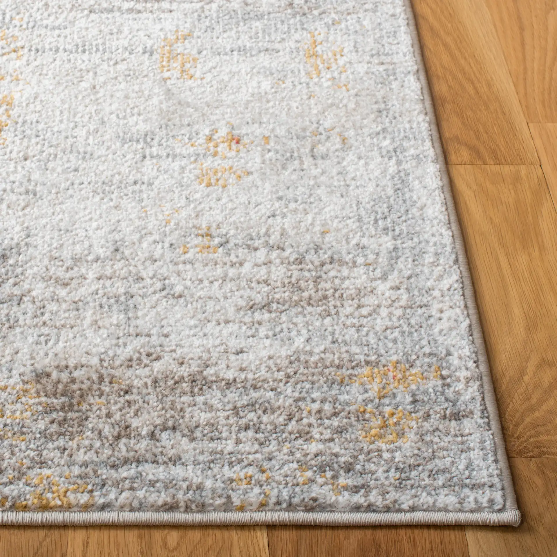 Phoenix Abstract Brushstroke Rug in Ivory / Gray in a styled room