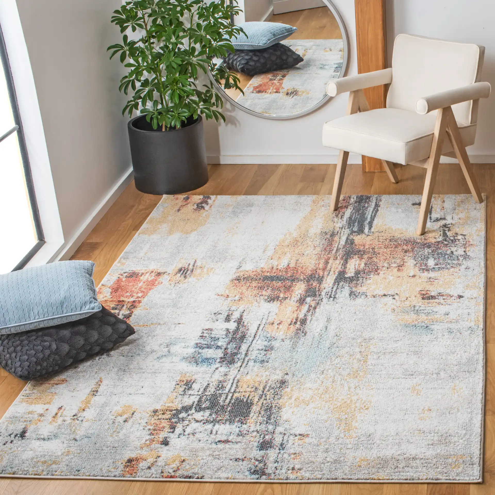 Phoenix Abstract Brushstroke Rug in Ivory / Gray in a styled room