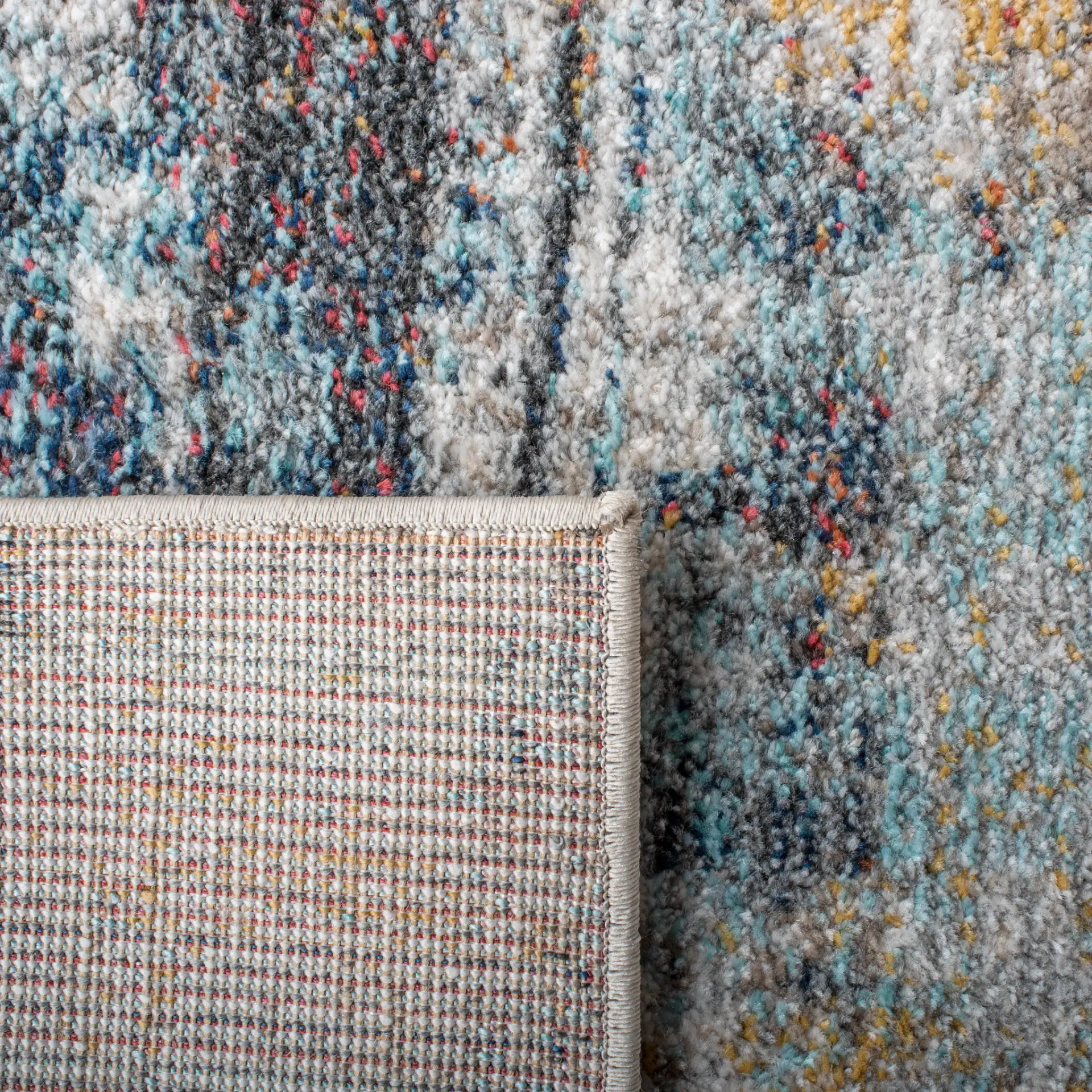 Phoenix Abstract Brushstroke Rug in Ivory / Gray in a styled room