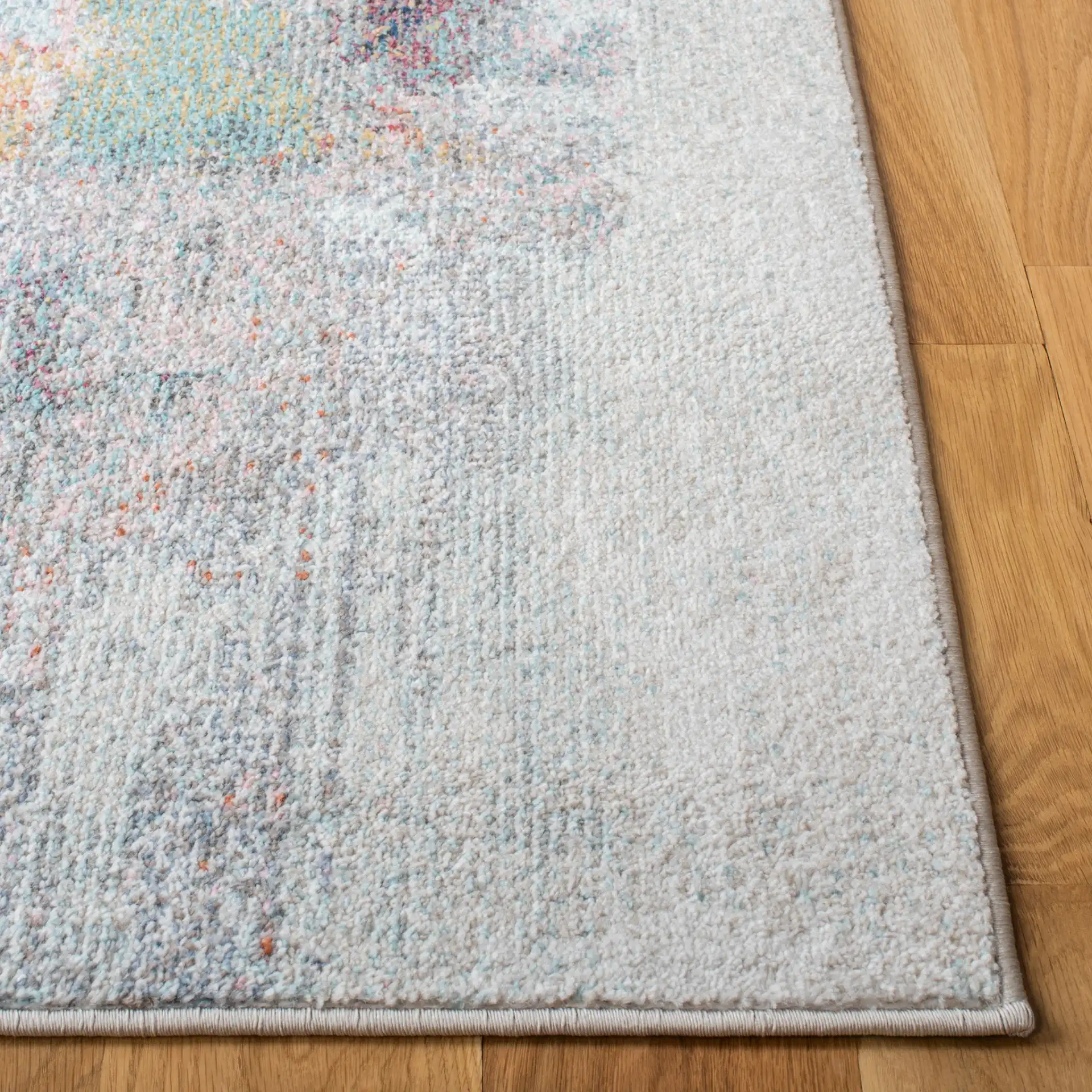 Phoenix Abstract Block Rug in Ivory / Gray in a styled room