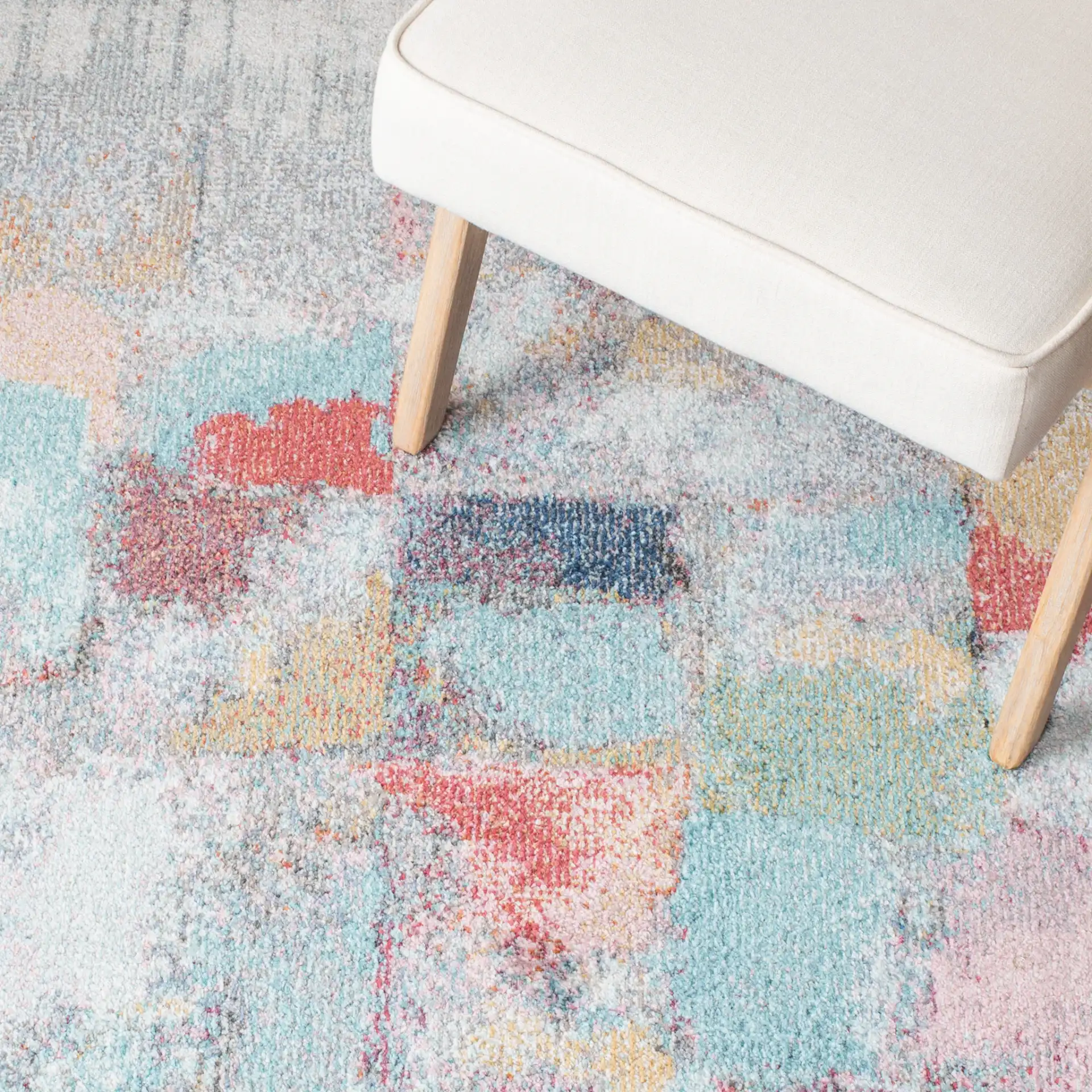 Phoenix Abstract Block Rug in Ivory / Gray in a styled room