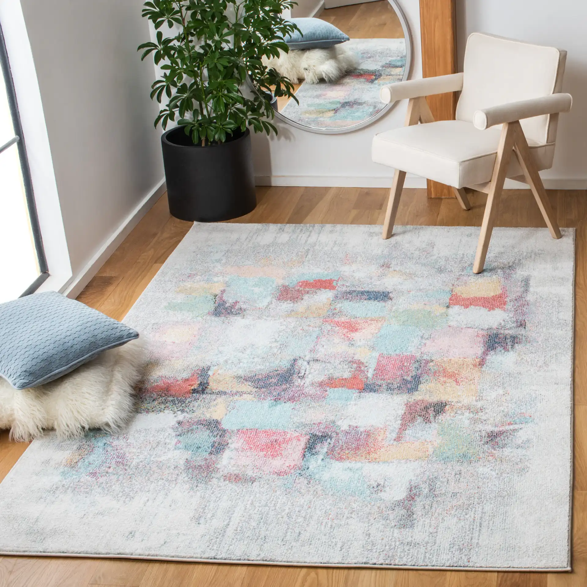 Phoenix Abstract Block Rug in Ivory / Gray in a styled room
