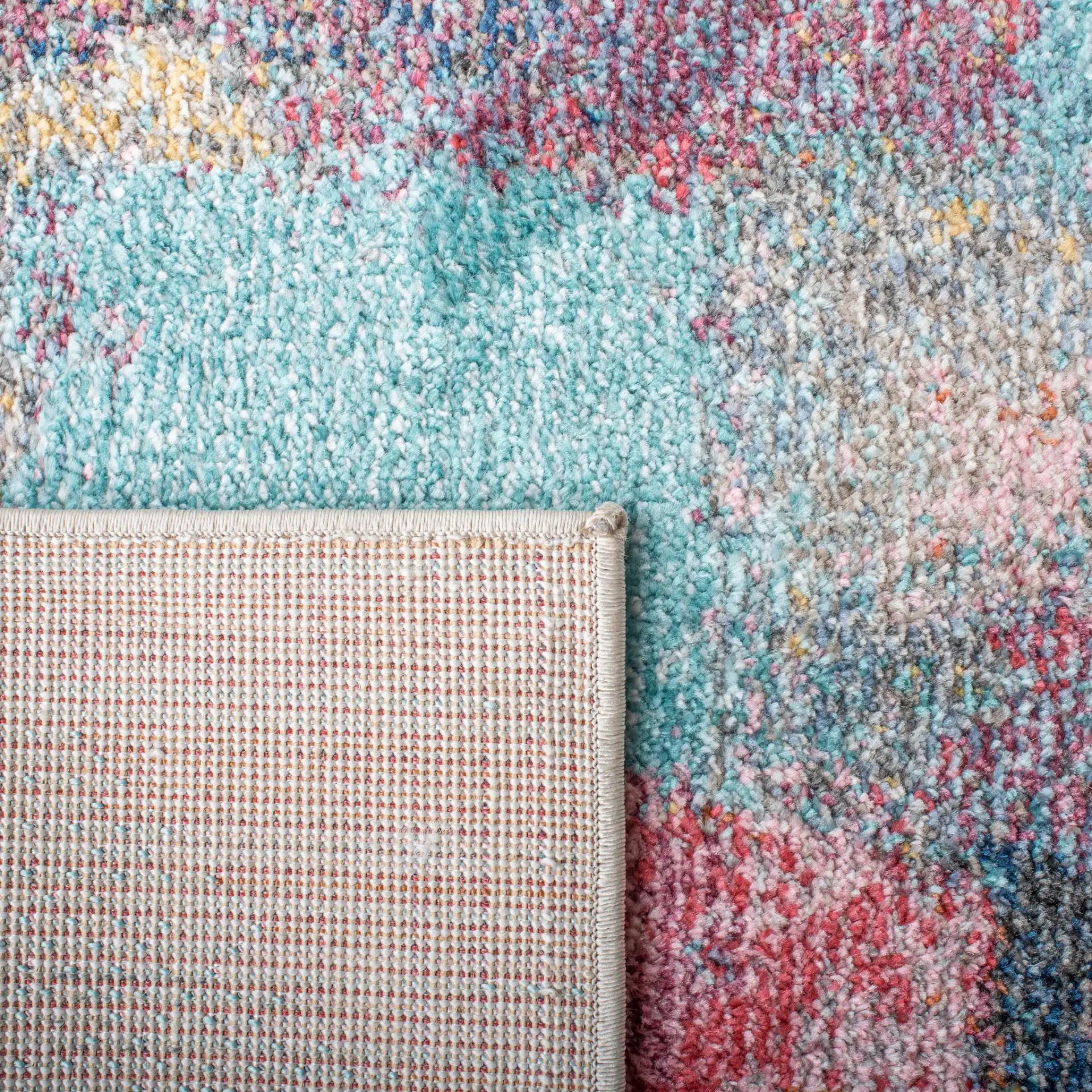 Phoenix Abstract Block Rug in Ivory / Gray in a styled room