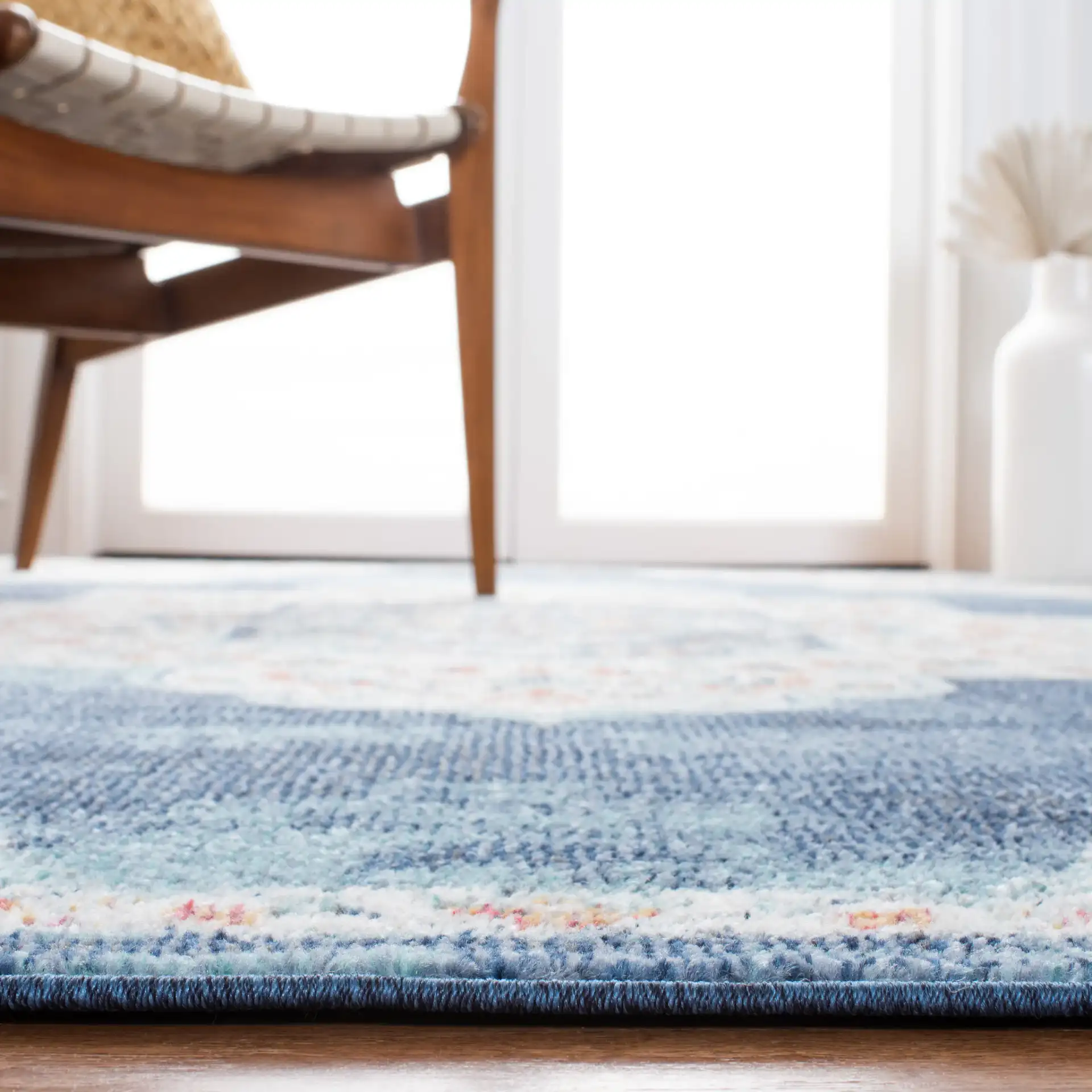Phoenix Medallion Rug in Navy / Ivory in a styled room