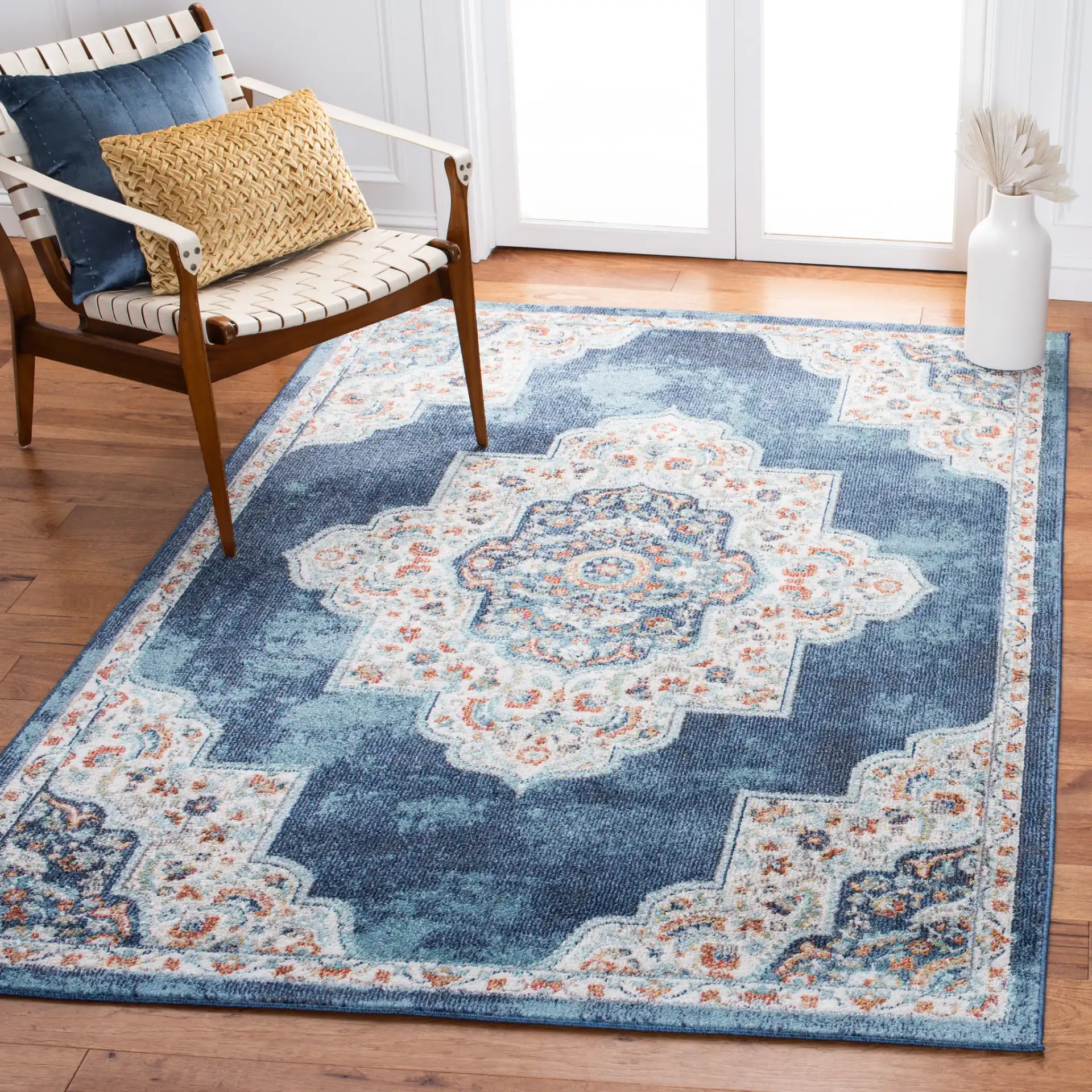 Phoenix Medallion Rug in Navy / Ivory in a styled room