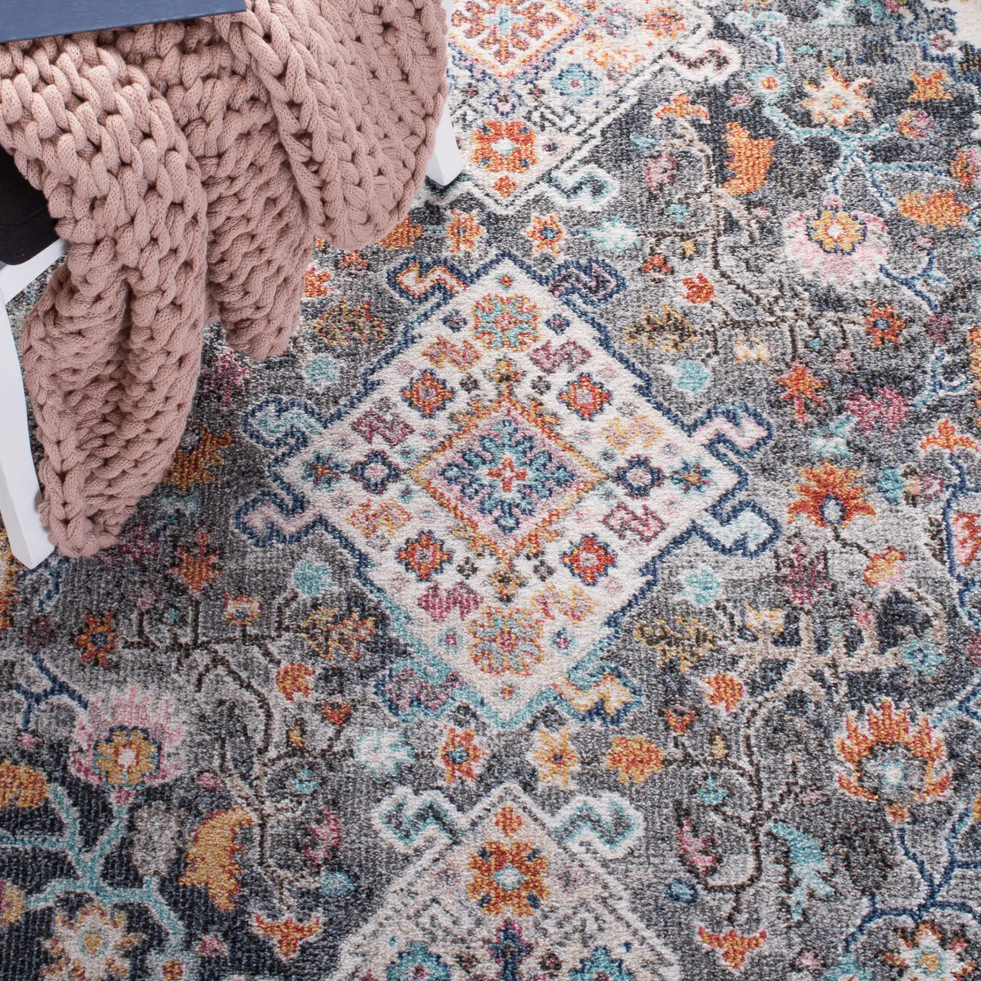 Phoenix Medallion Border Rug in Ivory / Gray in a styled room