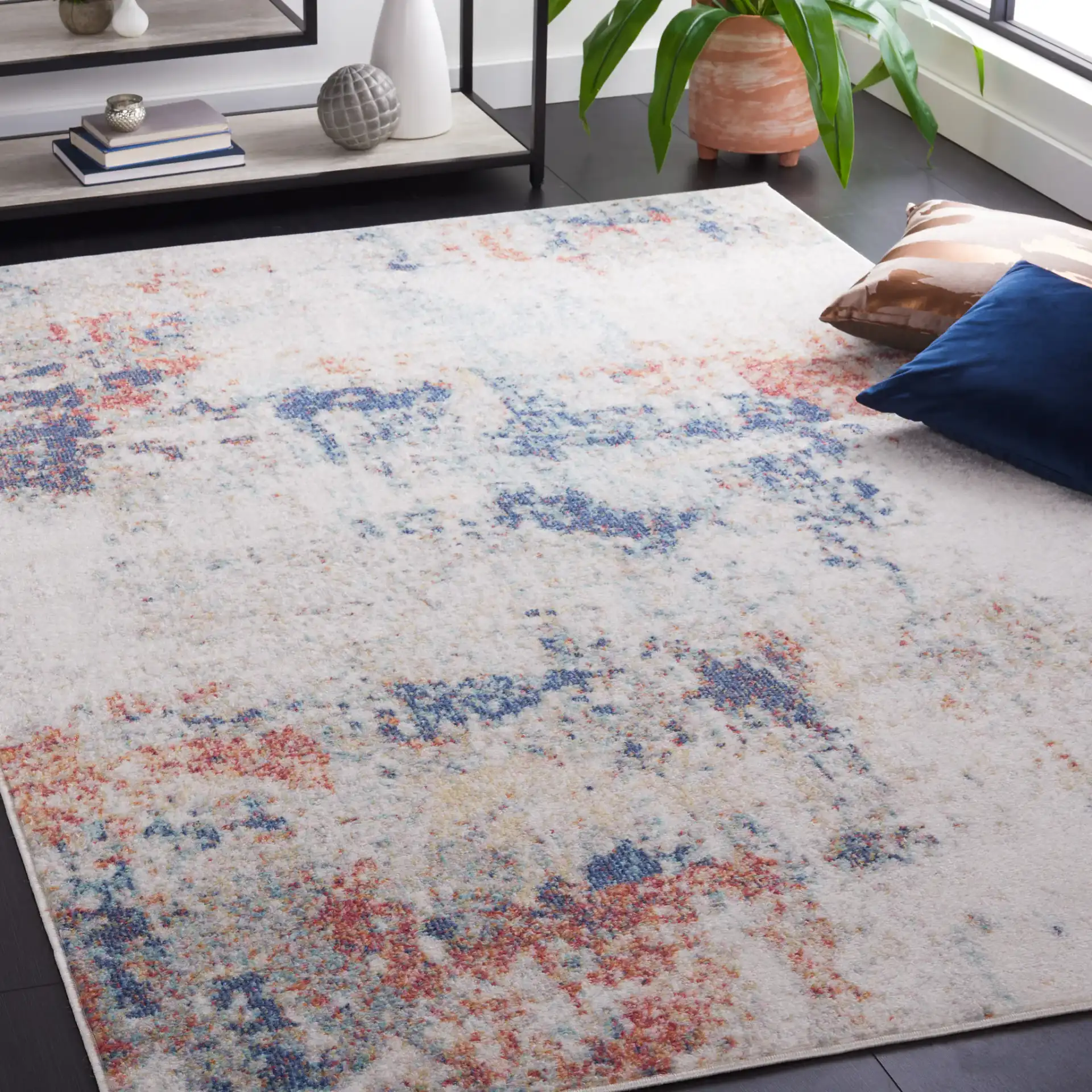 Phoenix Painterly Abstract Rug in Ivory / Blue Rust in a styled room