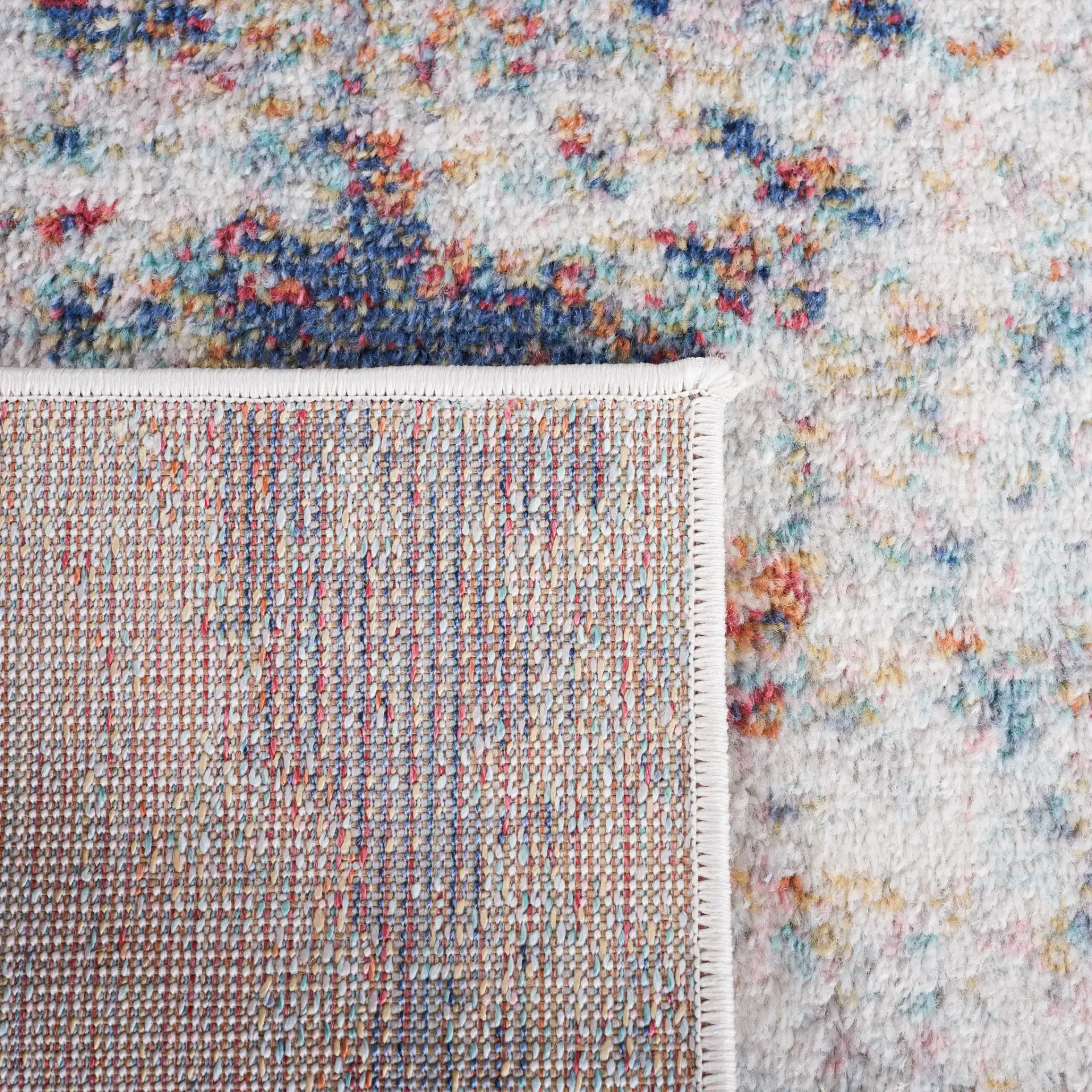 Phoenix Painterly Abstract Rug in Ivory / Blue Rust in a styled room
