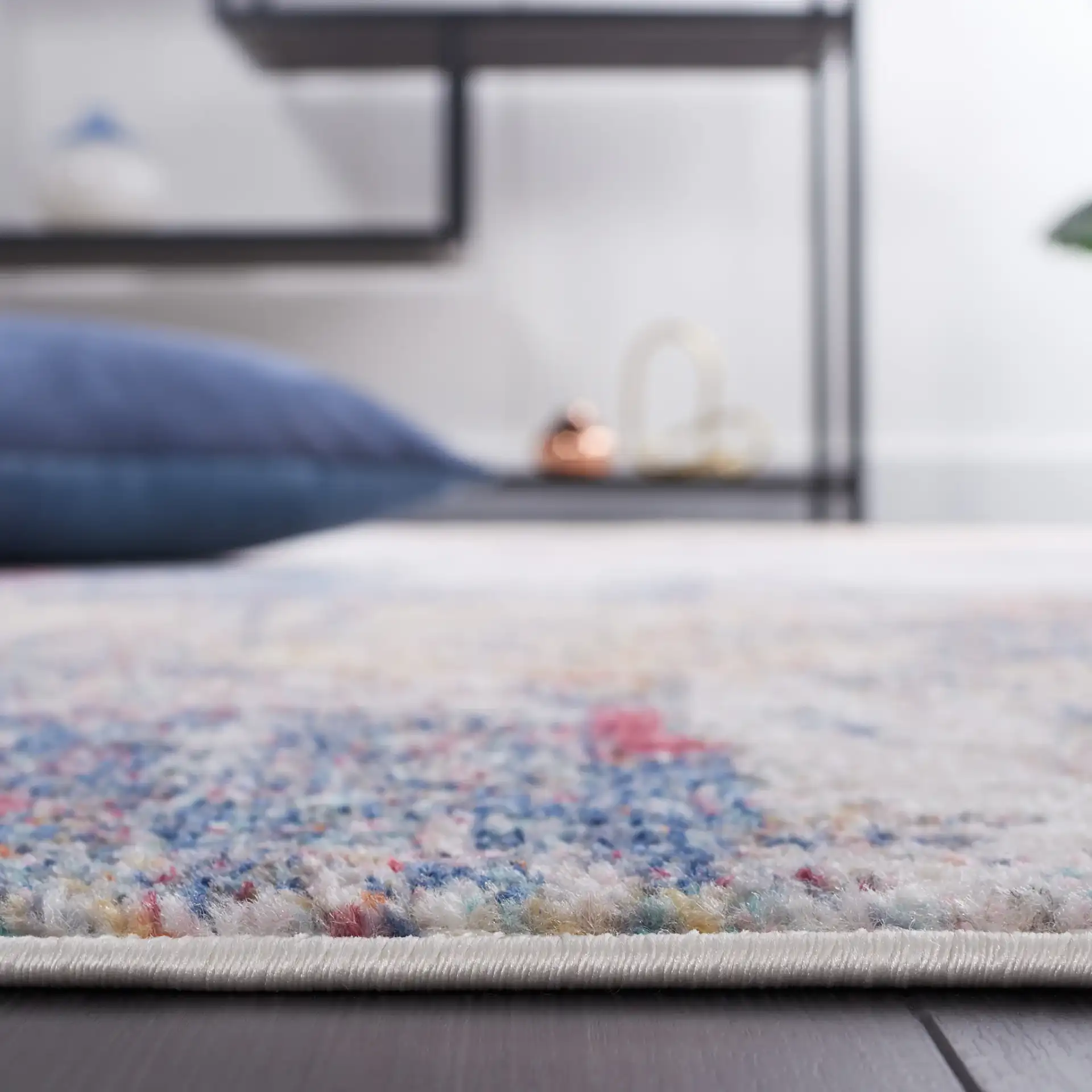 Phoenix Abstract Distressed Rug in Ivory / Blue Rust in a styled room