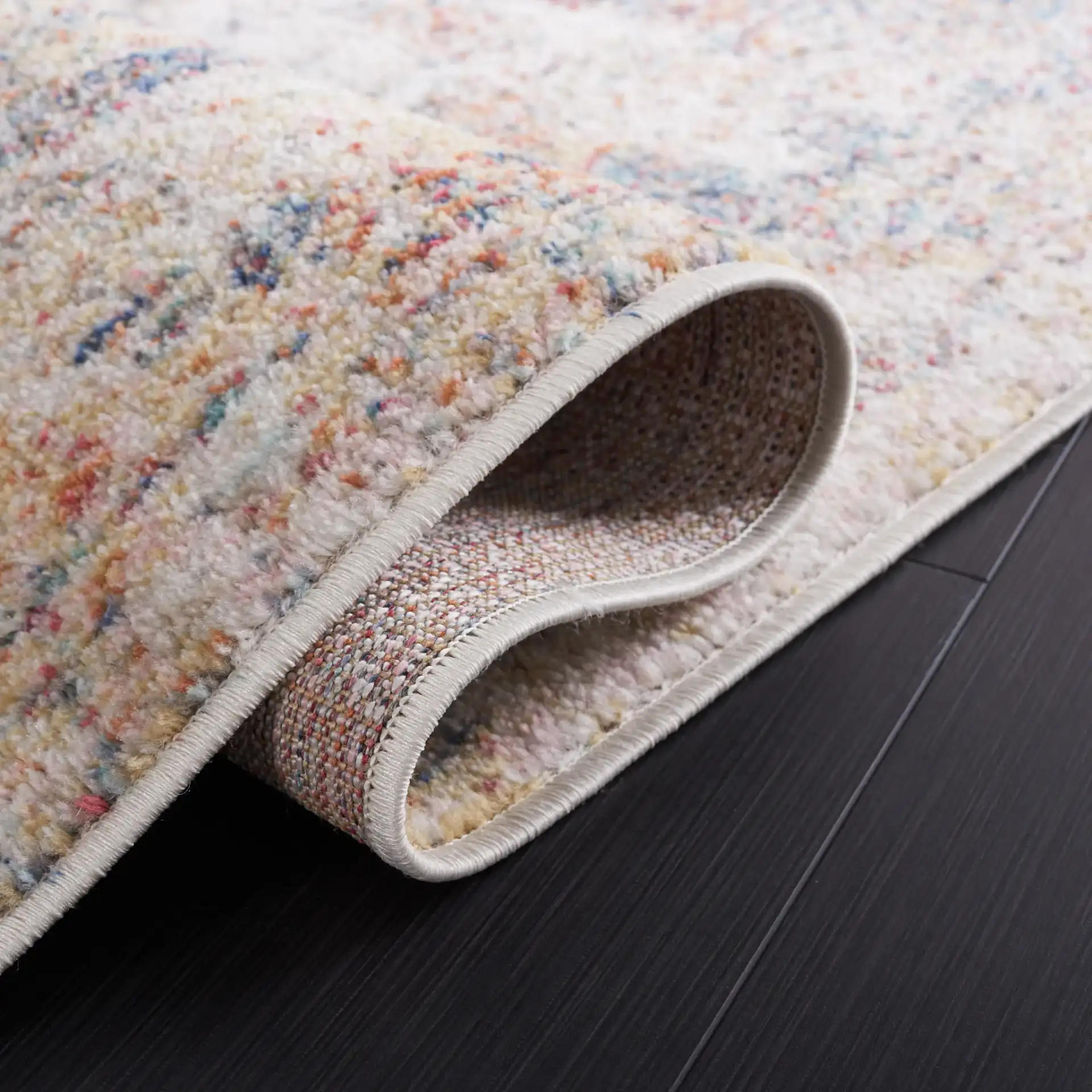 Phoenix Abstract Distressed Rug in Ivory / Blue Rust in a styled room