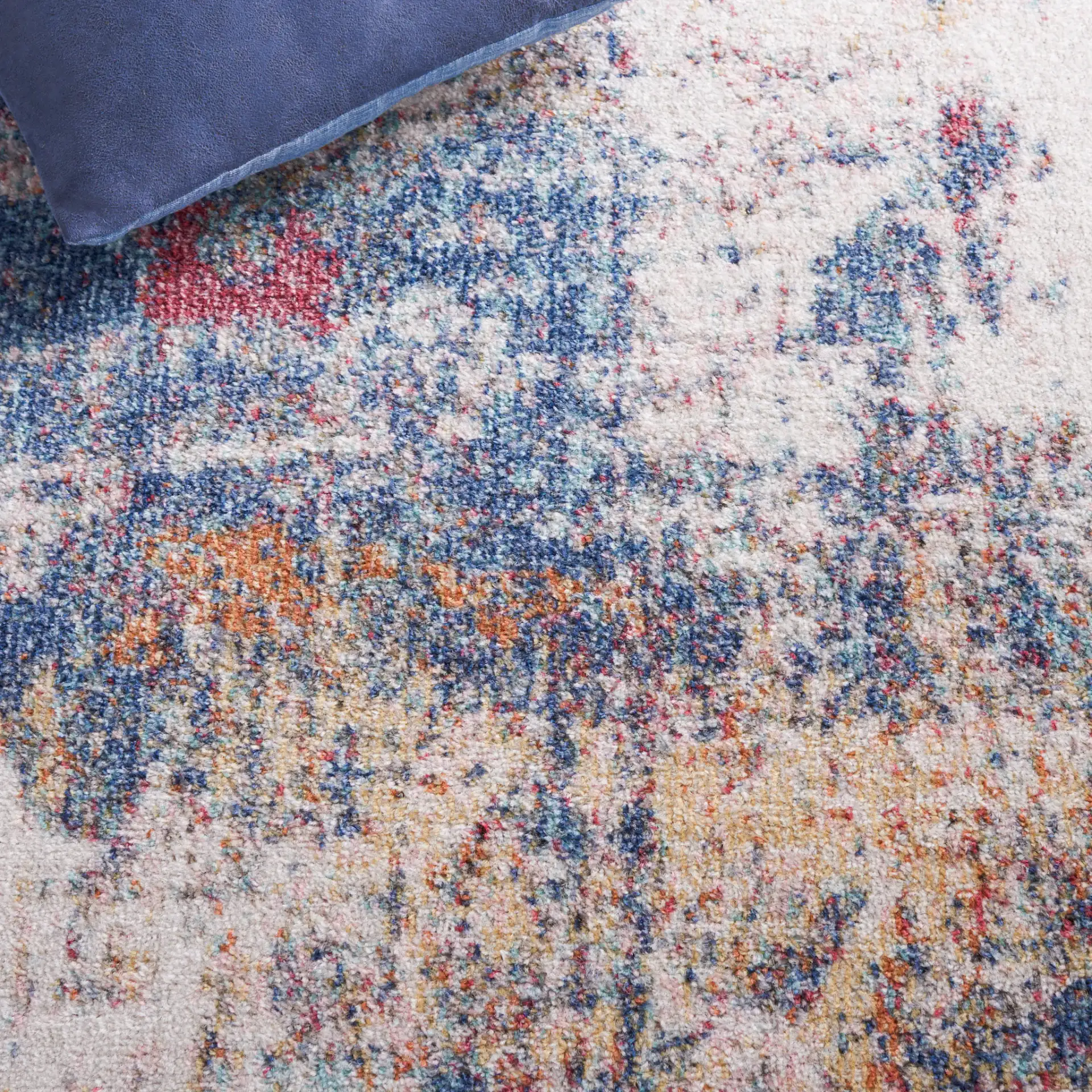 Phoenix Abstract Distressed Rug in Ivory / Blue Rust in a styled room