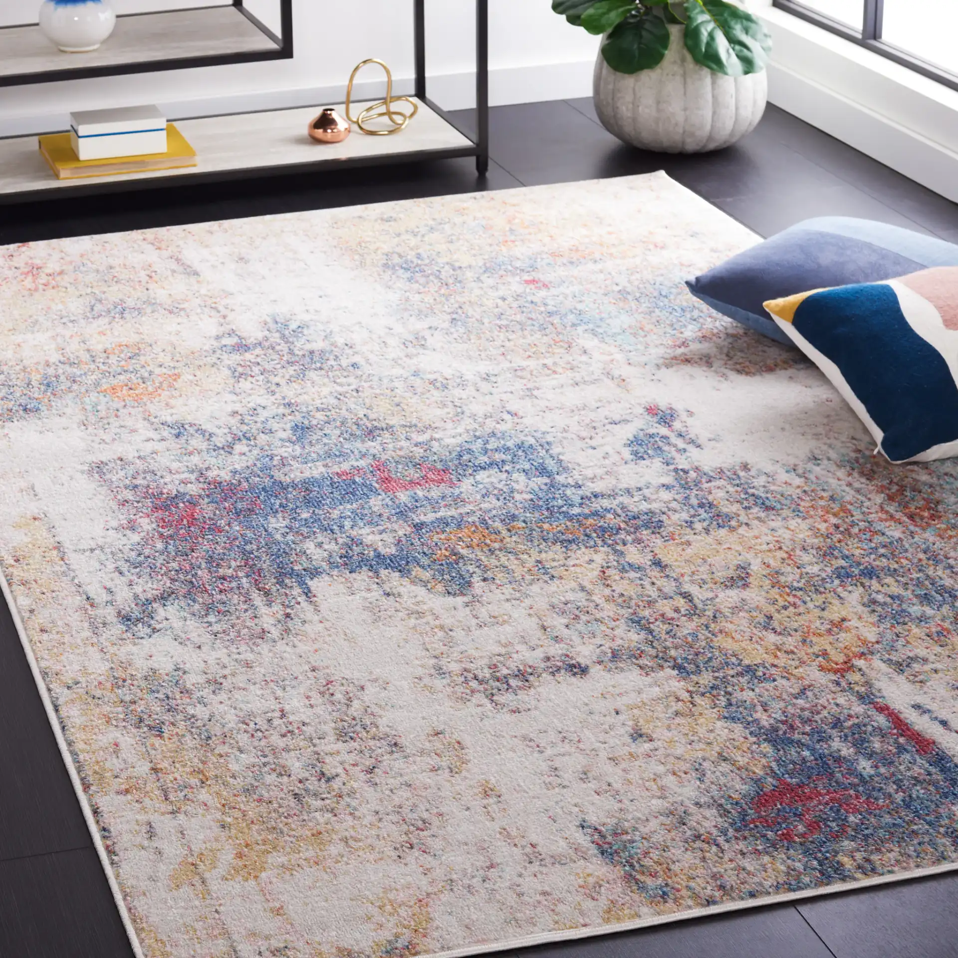 Phoenix Abstract Distressed Rug in Ivory / Blue Rust in a styled room