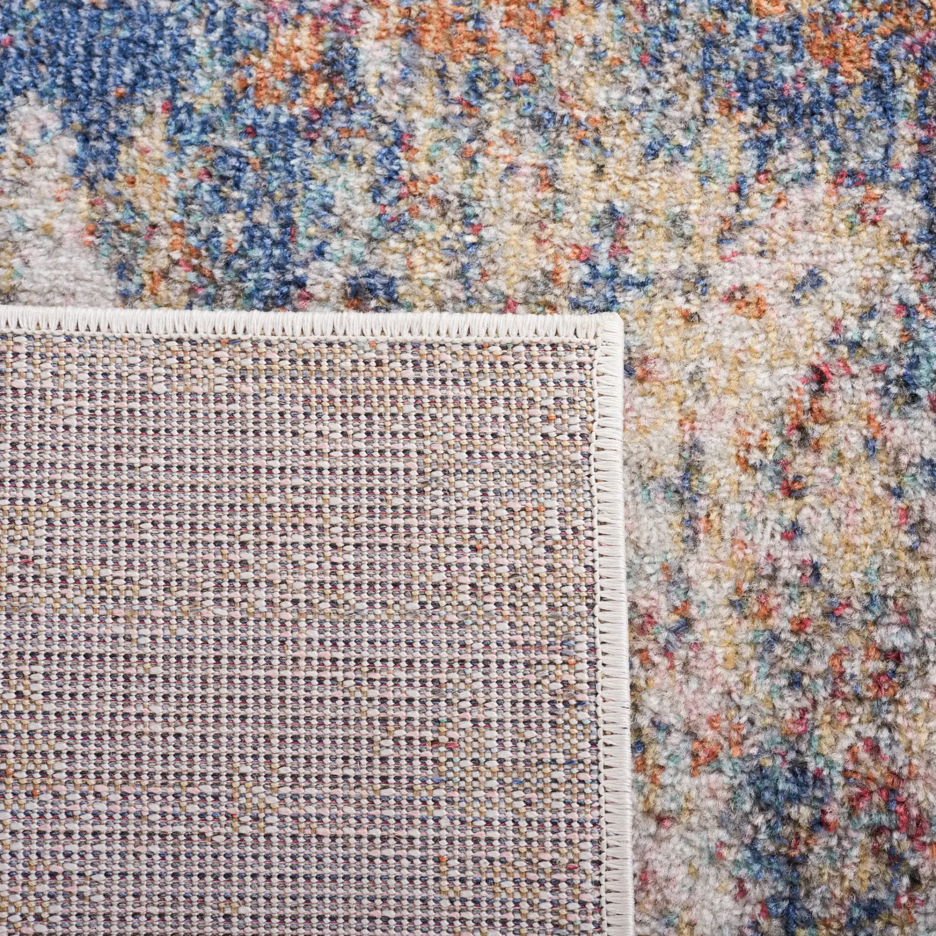 Phoenix Abstract Distressed Rug in Ivory / Blue Rust in a styled room