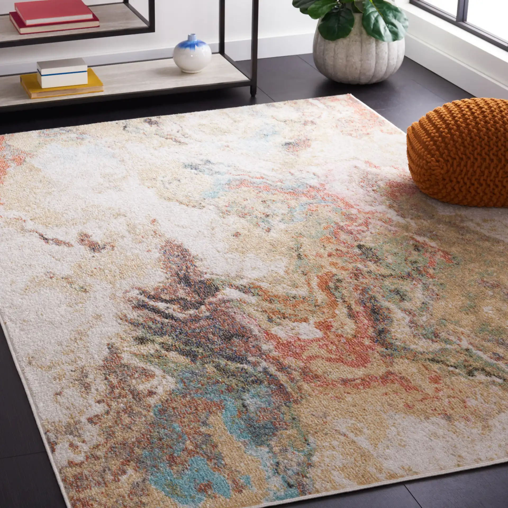 Phoenix Swirling Abstract Rug in Ivory / Gold Rust in a styled room