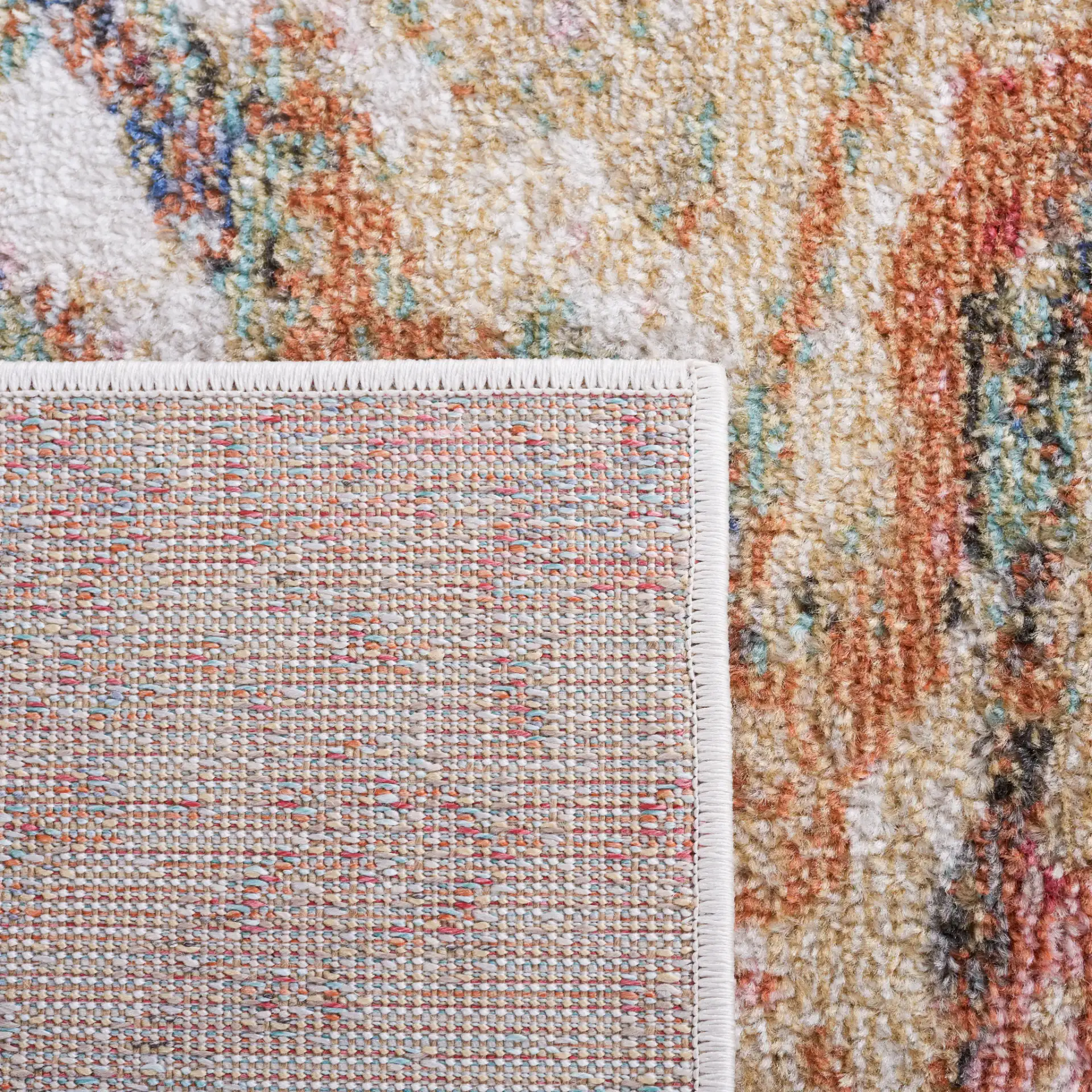 Phoenix Swirling Abstract Rug in Ivory / Gold Rust in a styled room