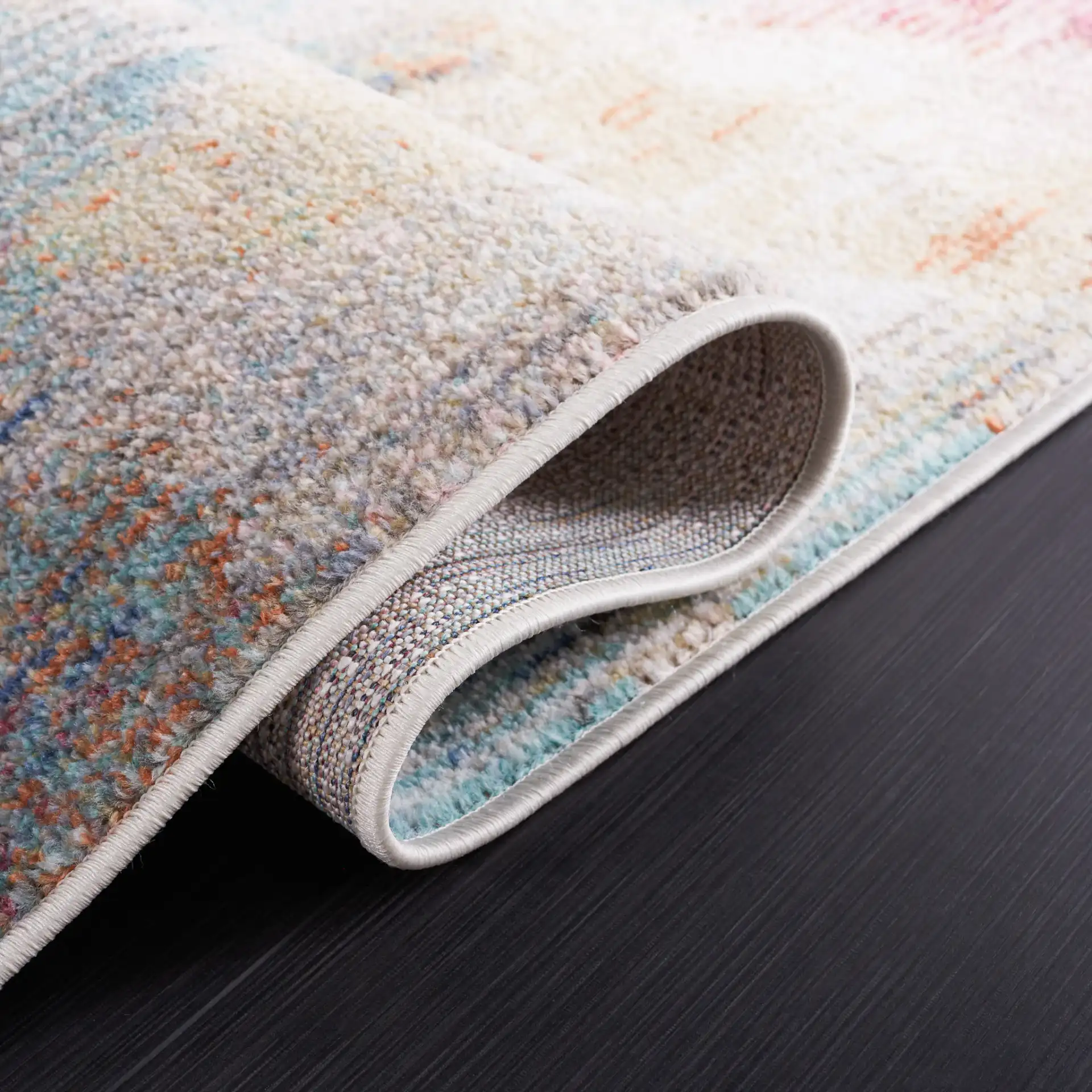Phoenix Abstract Painterly Rug in Aqua / Gold Rose in a styled room