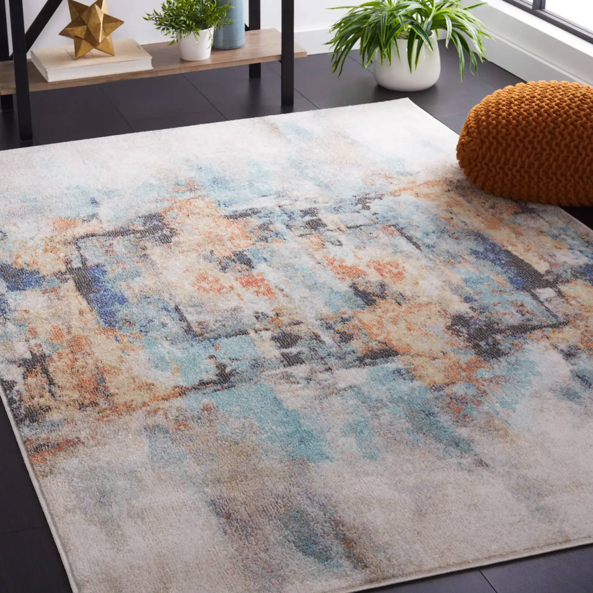 Phoenix Abstract Rug in Aqua / Gold Rust in a styled room