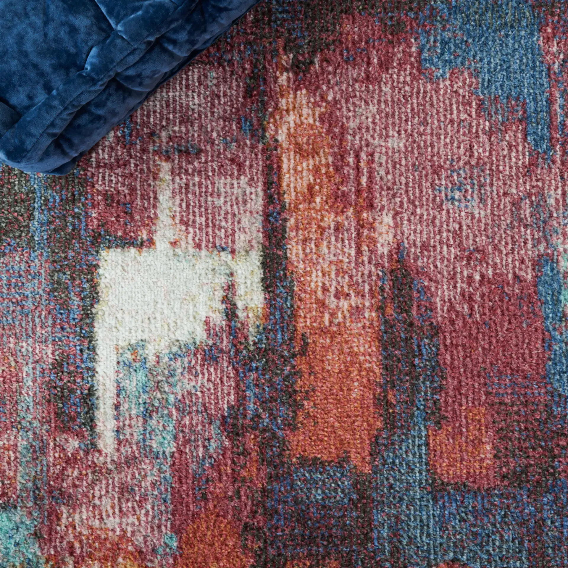 Phoenix Painterly Block Rug in Rust Blue / Ivory in a styled room