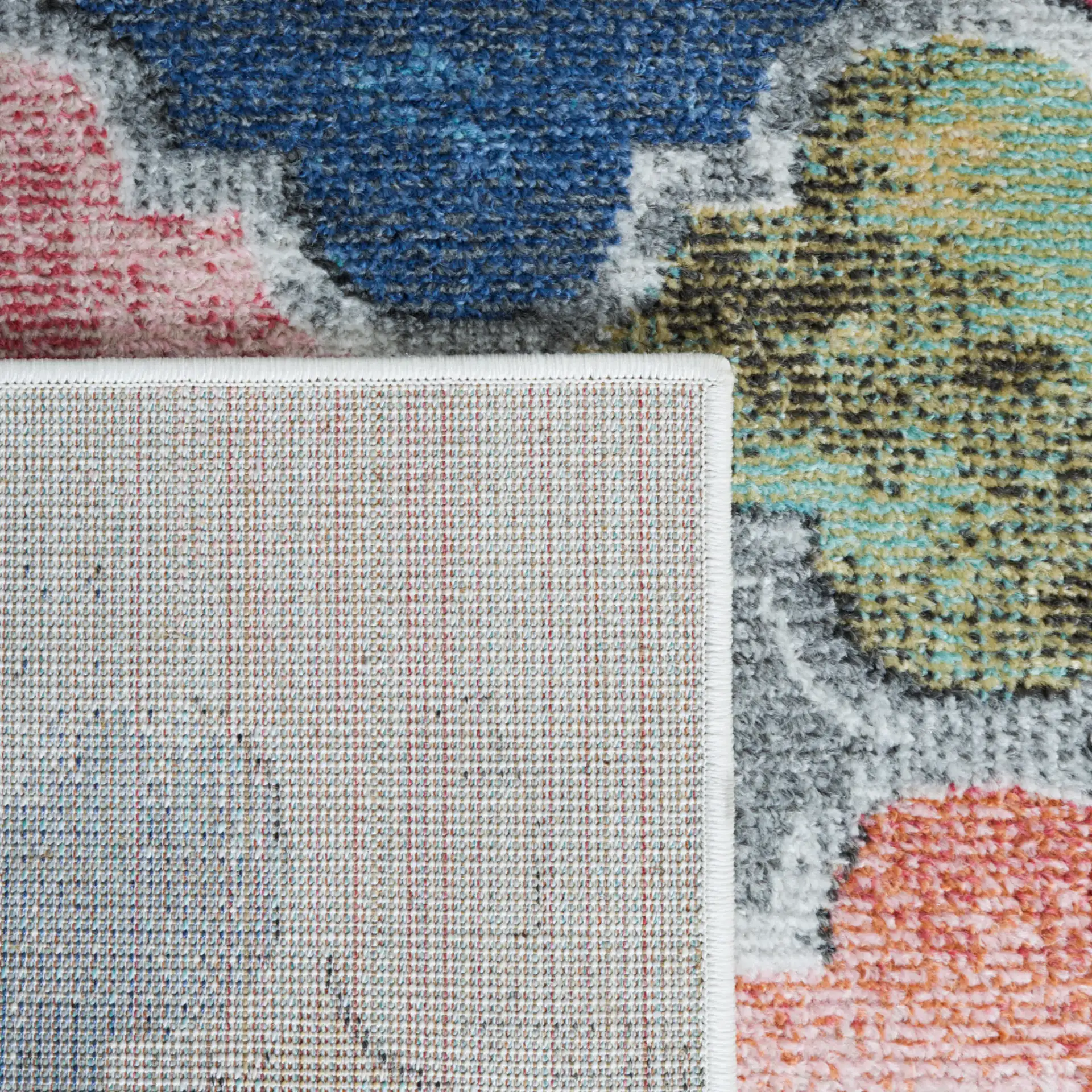Phoenix Curved Tile Rug in Blue / Red in a styled room
