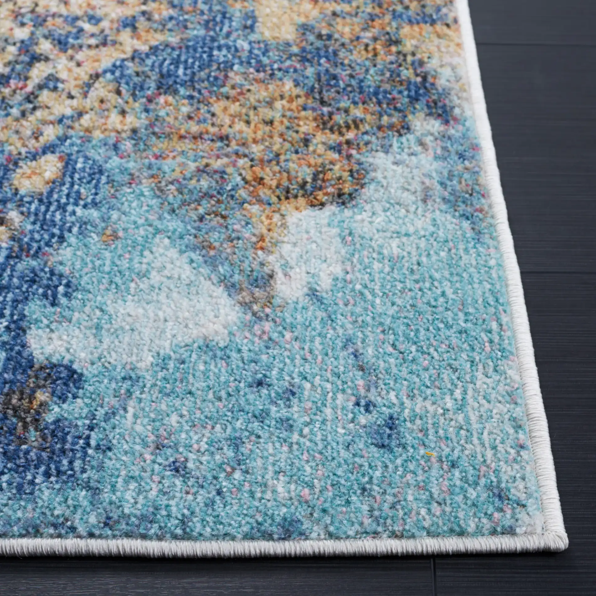 Phoenix Abstract Marble Rug in Blue in a styled room