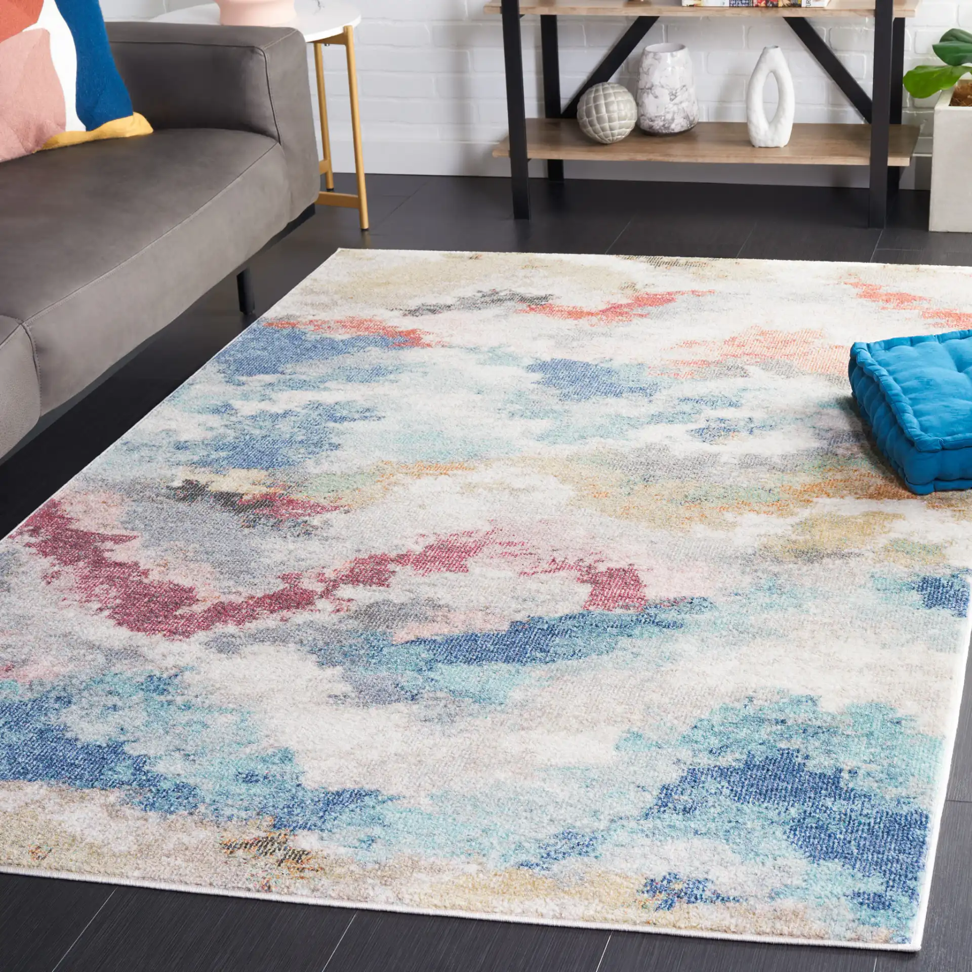Phoenix Abstract Cloud Rug in Ivory / Blue Rust in a styled room