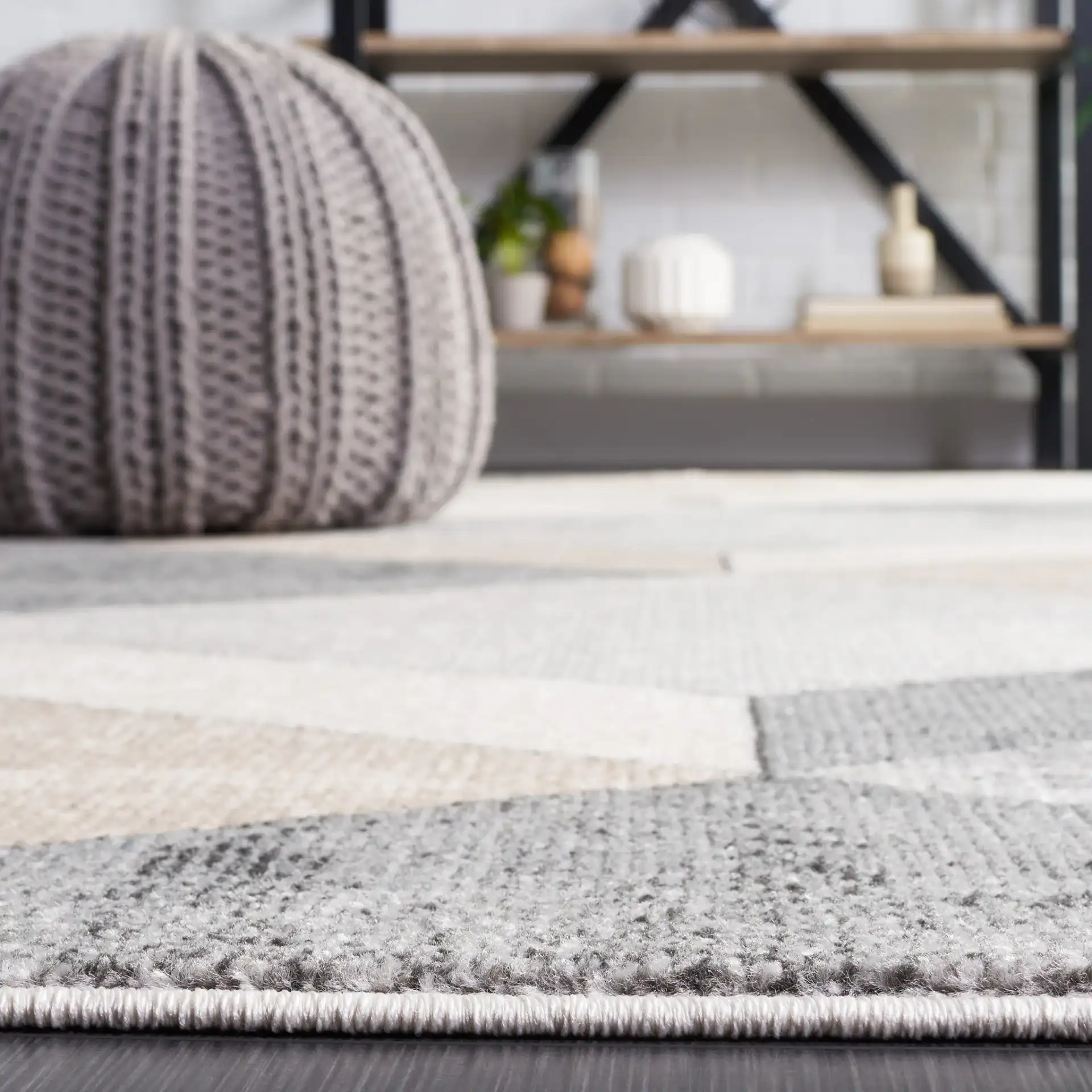 Phoenix Geometric Cube Rug in Light Gray / Beige Charcoal in a styled room