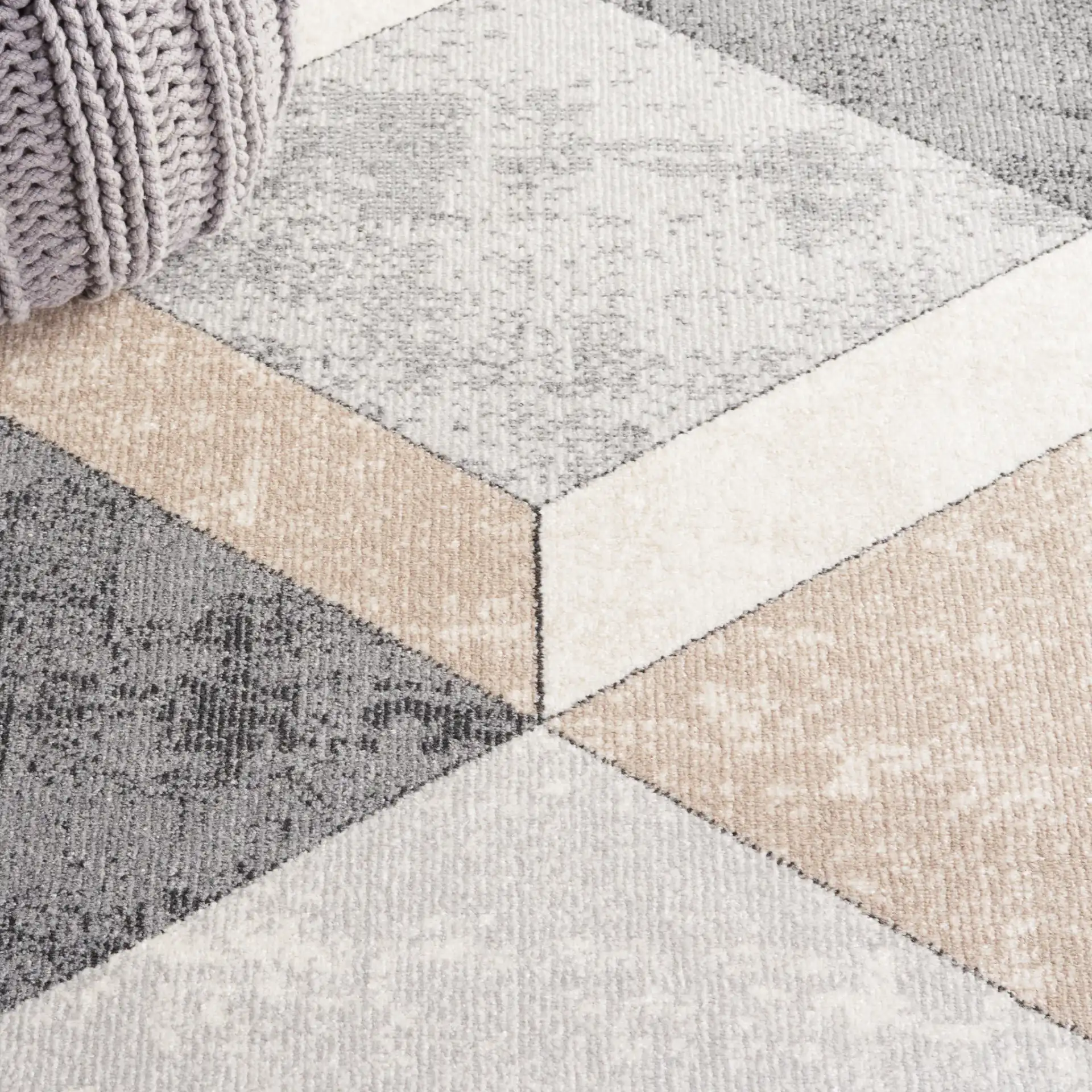 Phoenix Geometric Cube Rug in Light Gray / Beige Charcoal in a styled room