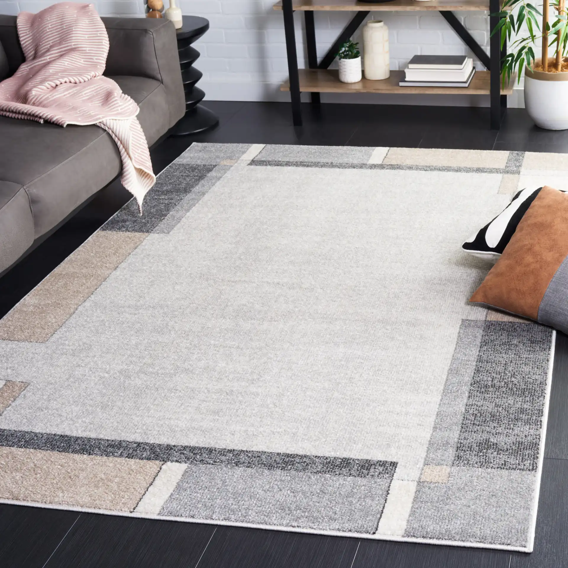 Phoenix Block Border Rug in Light Gray / Beige Charcoal in a styled room