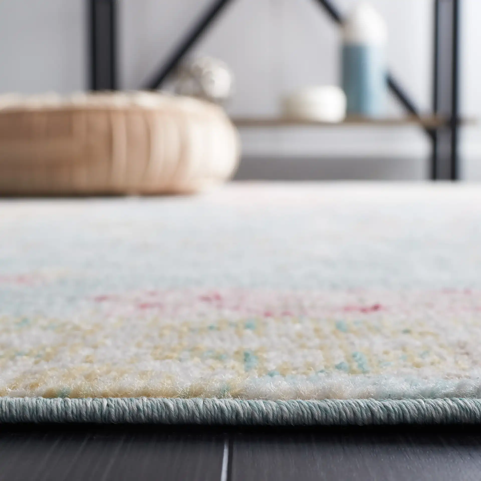 Phoenix Distressed Patchwork Rug in Blue / Rust in a styled room