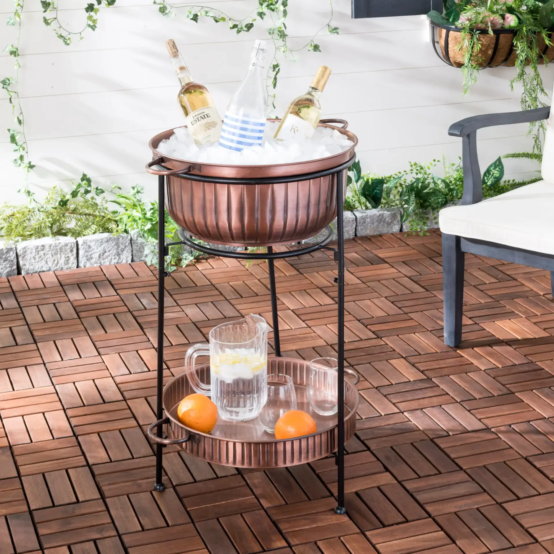 Naka Plant Stand in Antique Copper / Black in a styled room