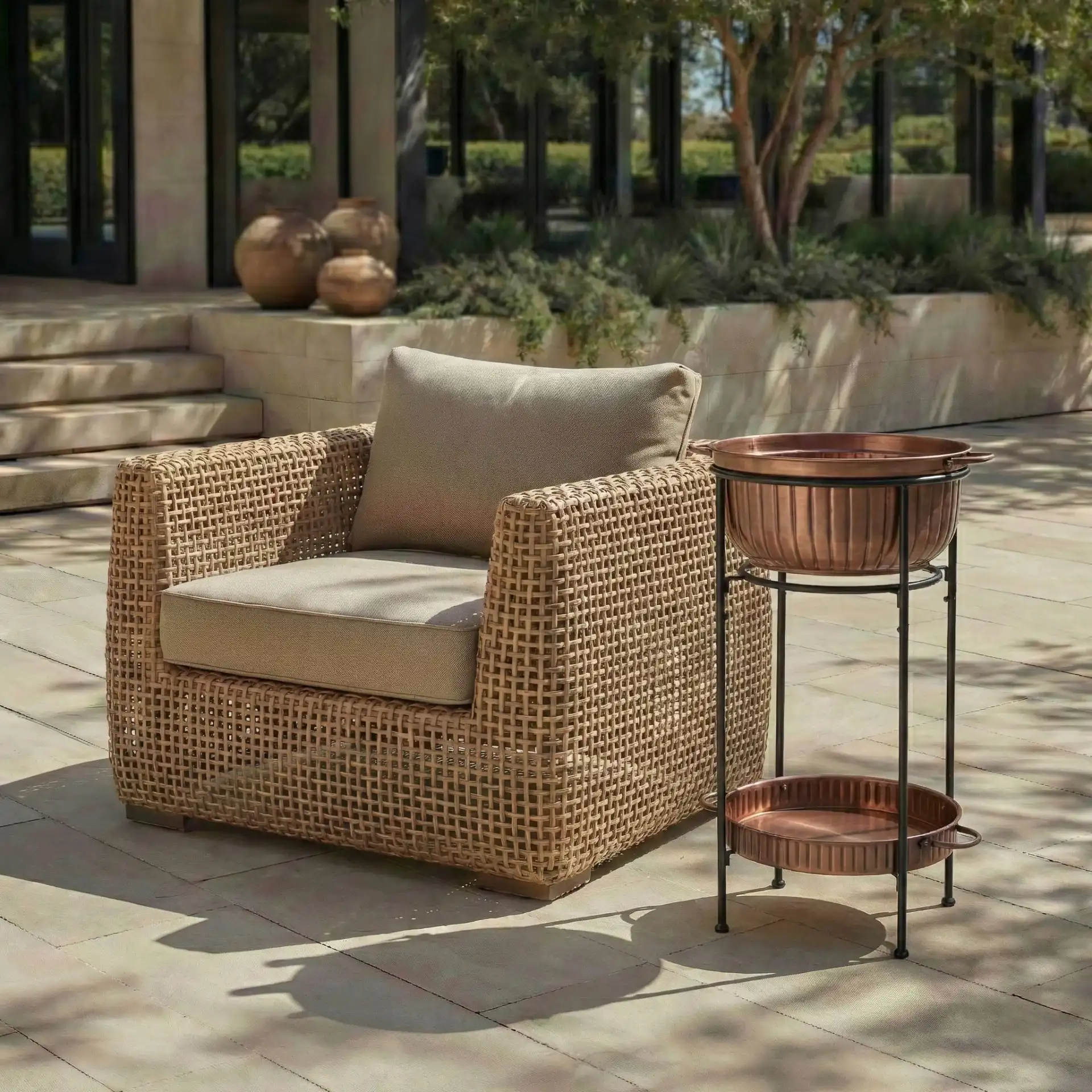 Naka Plant Stand in Antique Copper / Black in a styled room