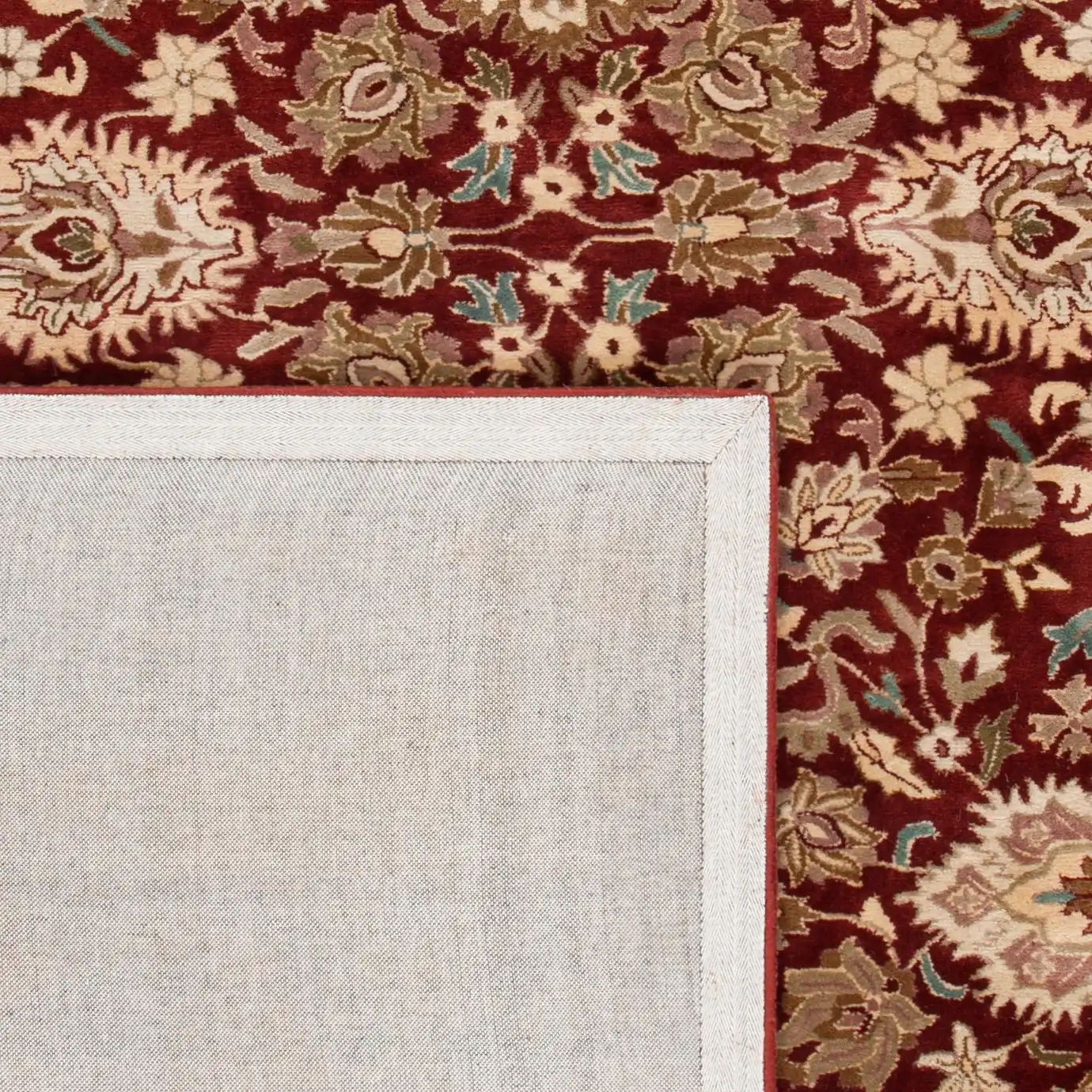 Persian Legend Floral Bordered Oval Wool Rug in Rust in a styled room