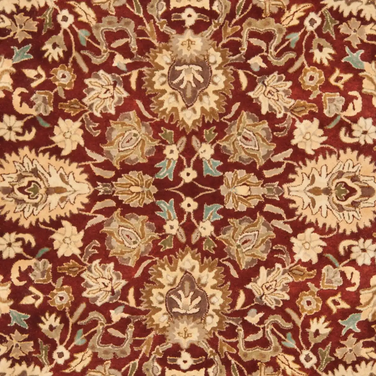 Persian Legend Floral Bordered Oval Wool Rug in Rust in a styled room