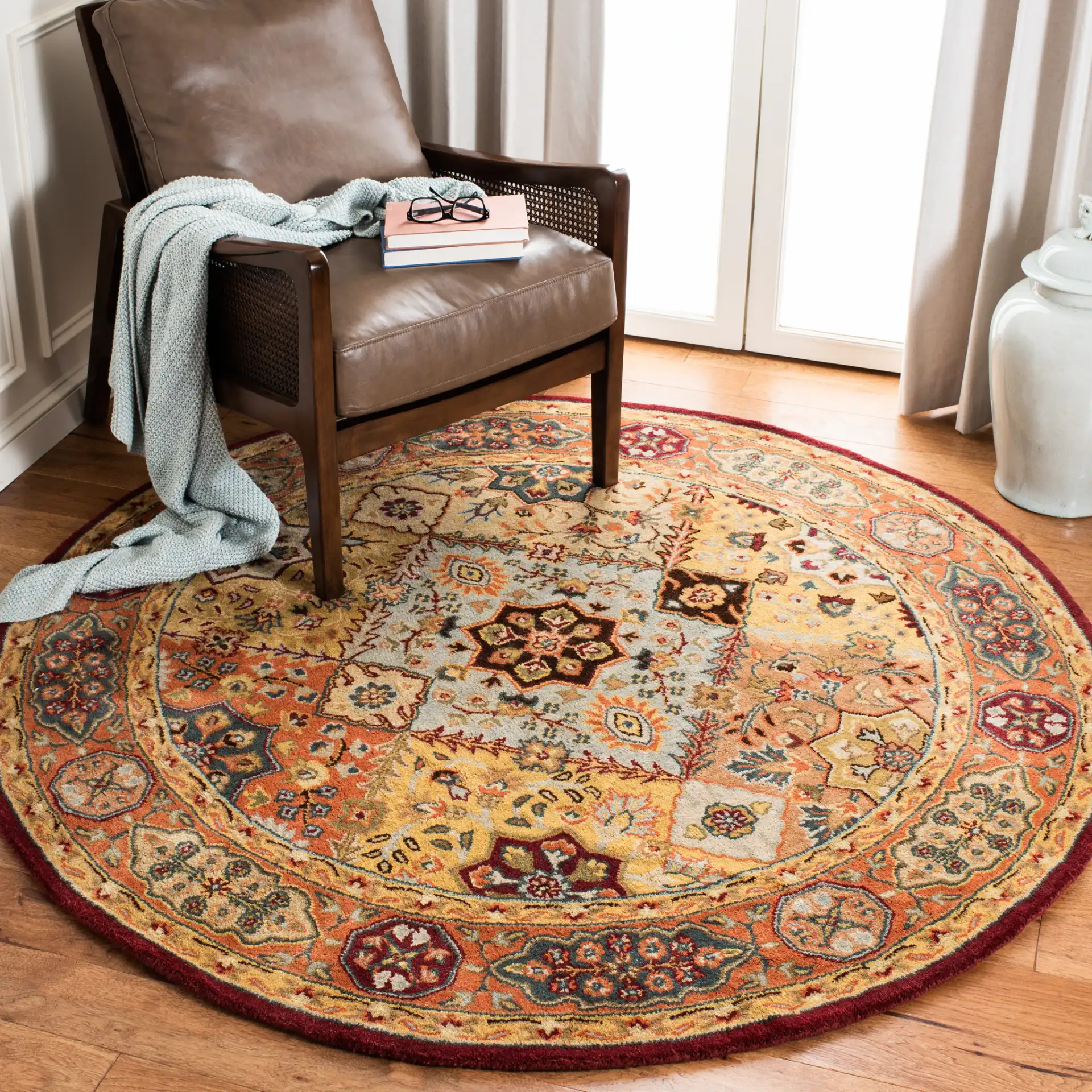 Persian Legend Floral Tile Hand-Tufted Wool Rug in Red / Rust in a styled room