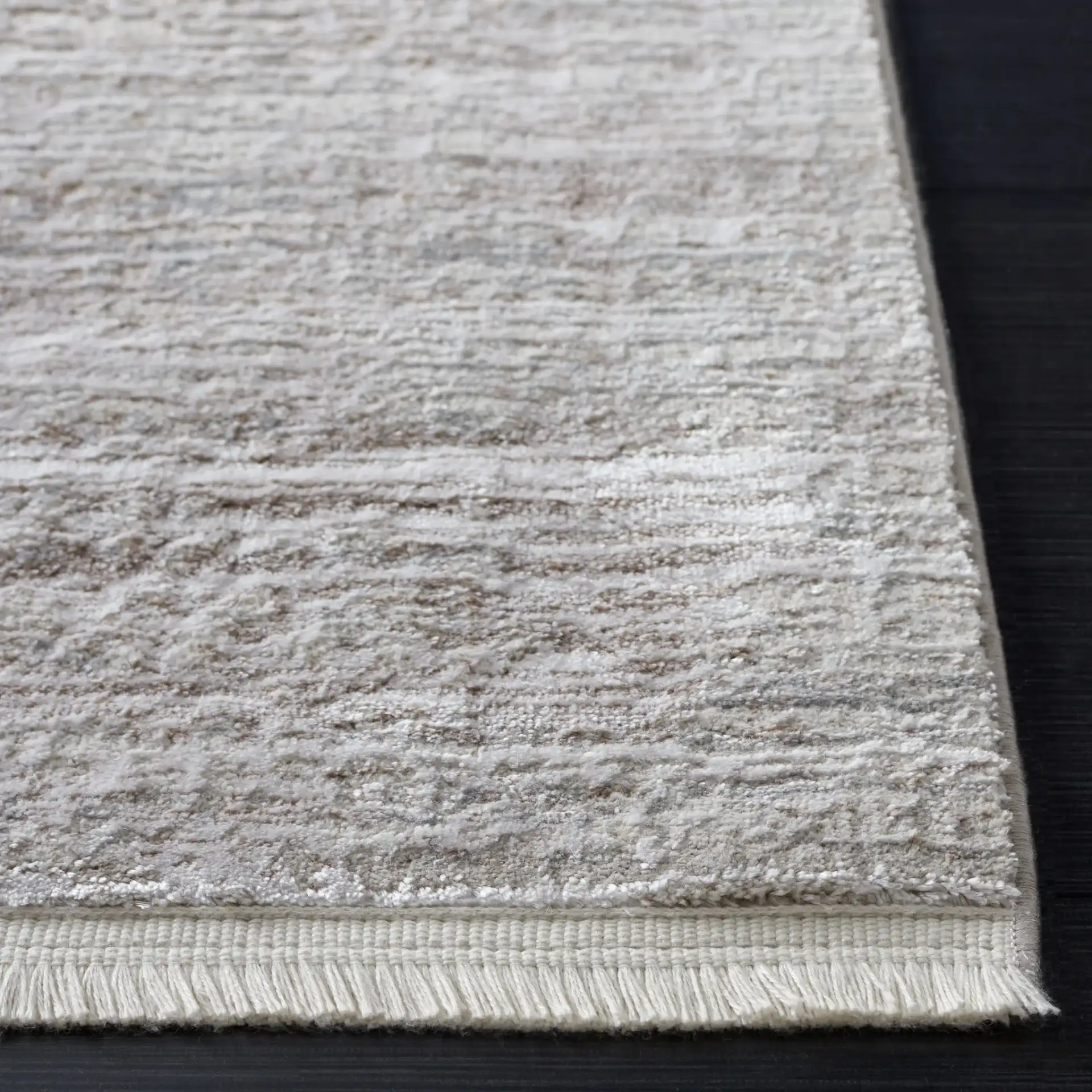 Platinum Distressed Border Rug in Gray / Beige in a styled room