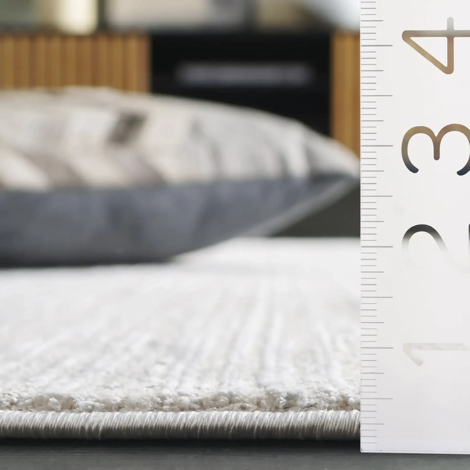 Platinum Striated Rug in Beige / Ivory in a styled room