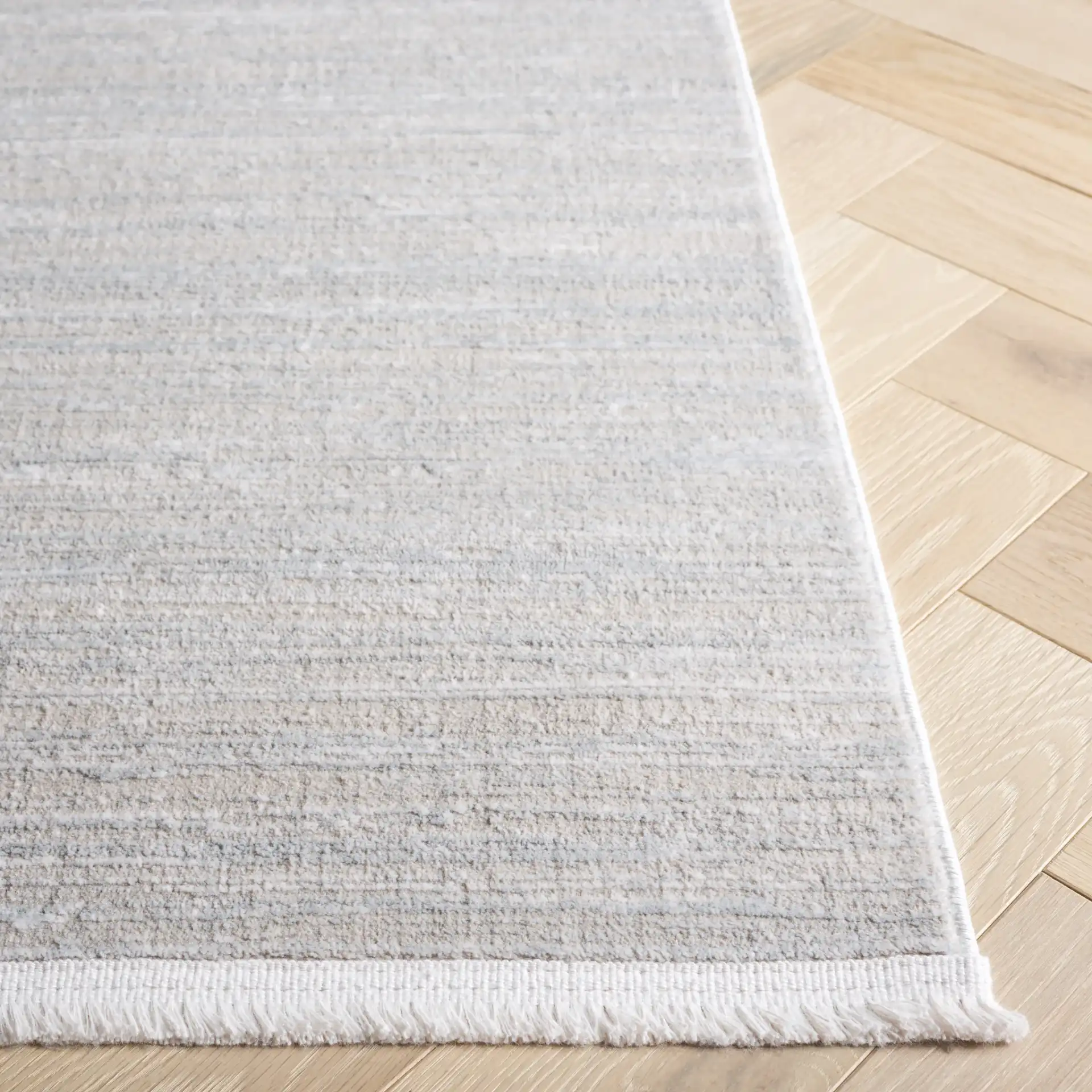 Platinum Linear Stripe Rug in Beige / Ivory in a styled room