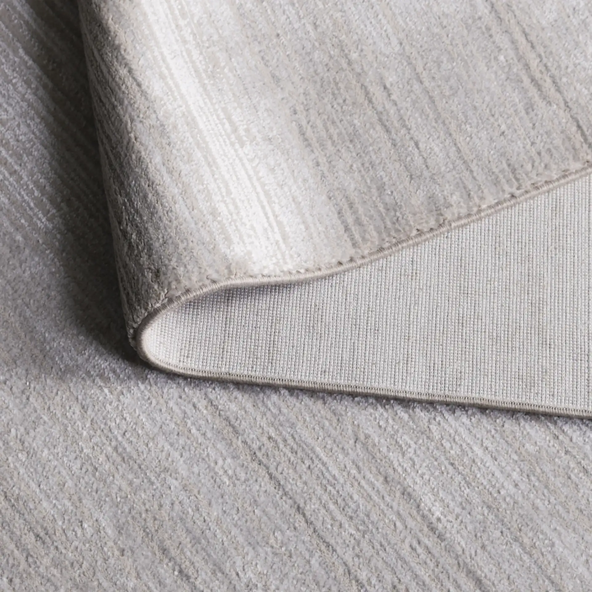 Platinum Fine Stripe Rug in Ivory / Beige in a styled room