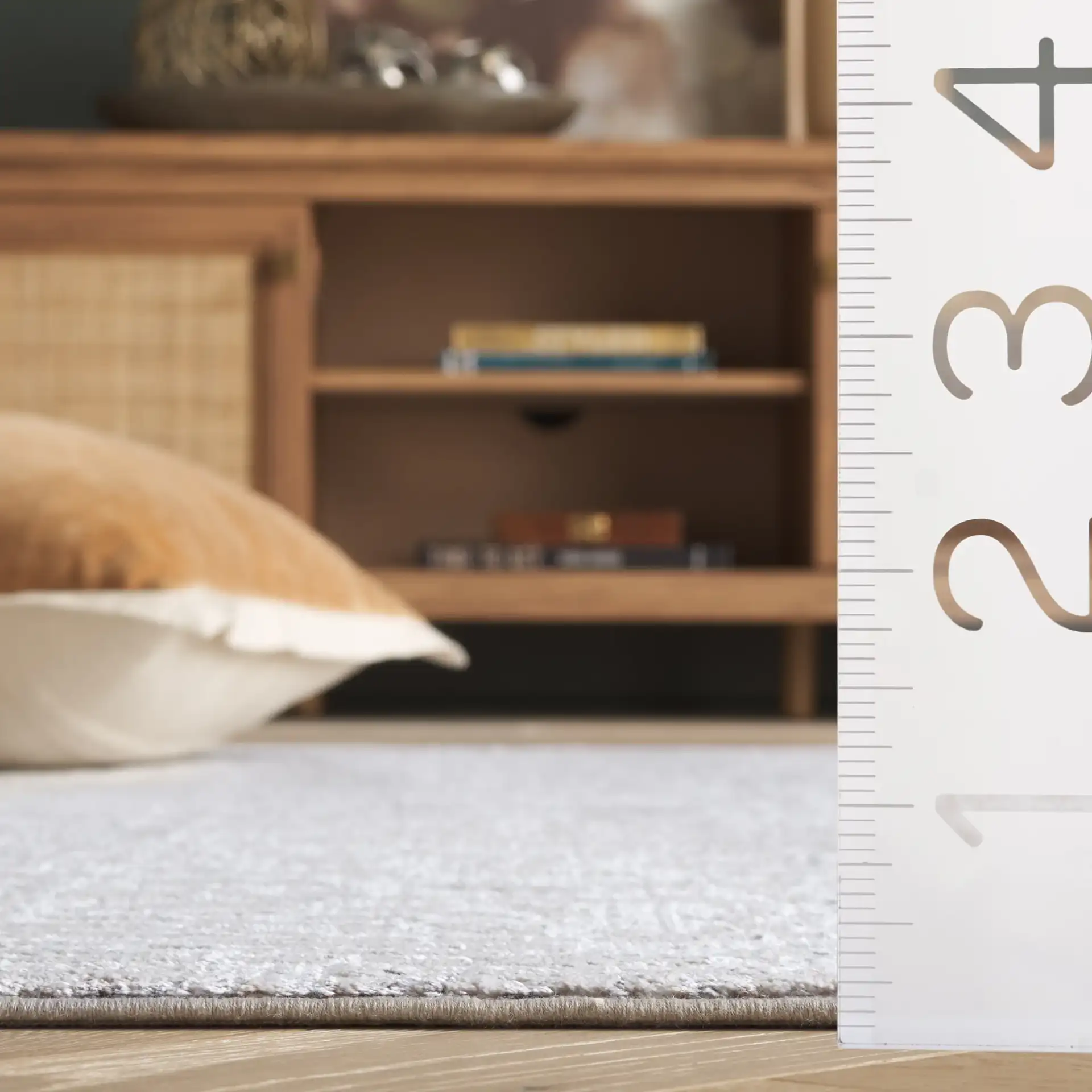 Platinum Distressed Texture Rug in Gray / Beige in a styled room