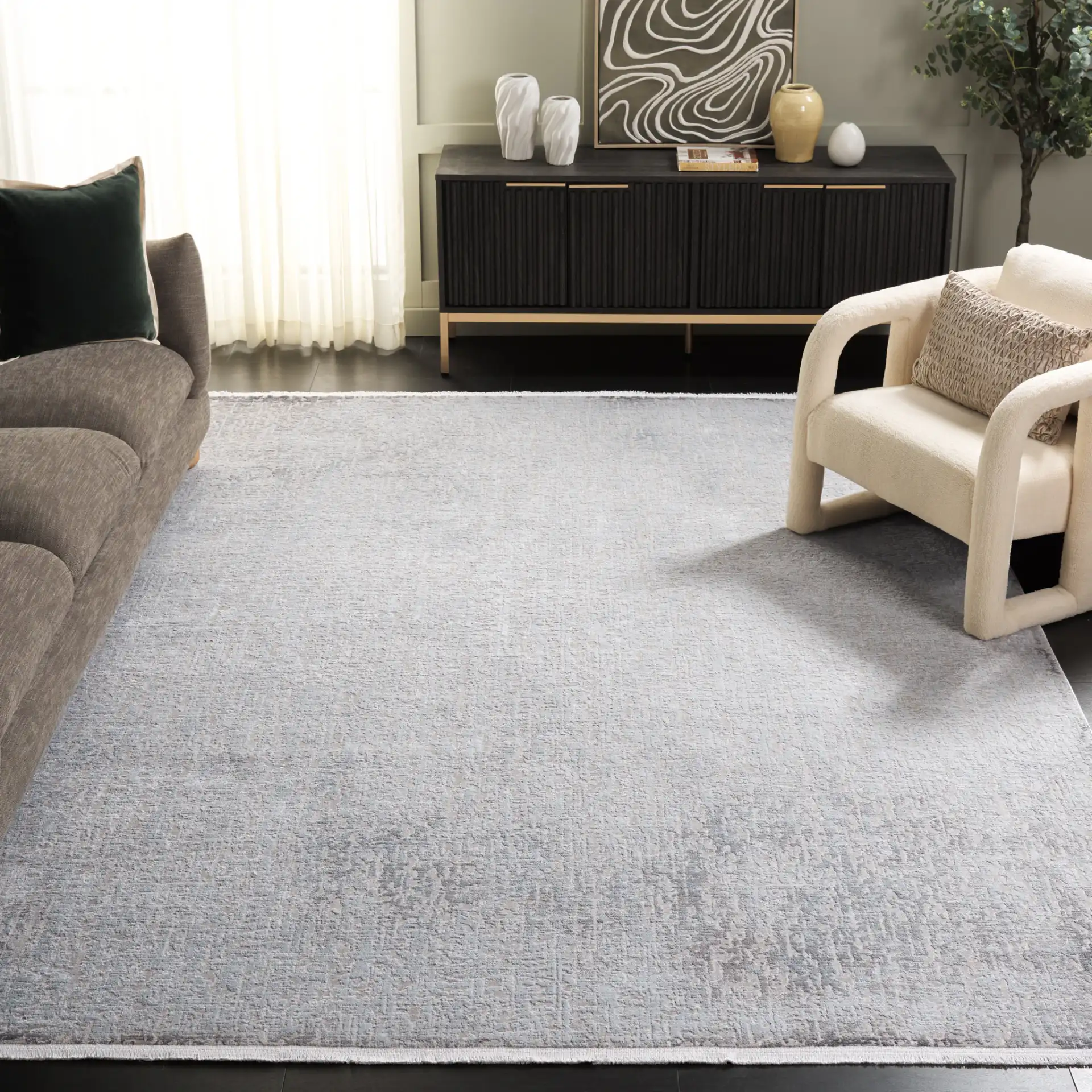 Platinum Distressed Texture Rug in Gray / Beige in a styled room