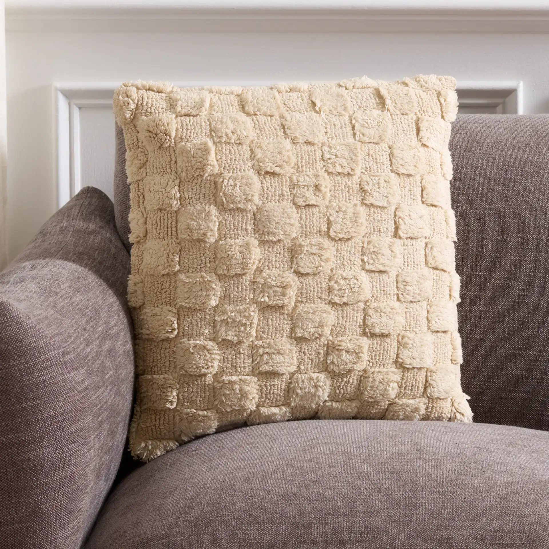 Indira Pillow in Ivory in a styled room